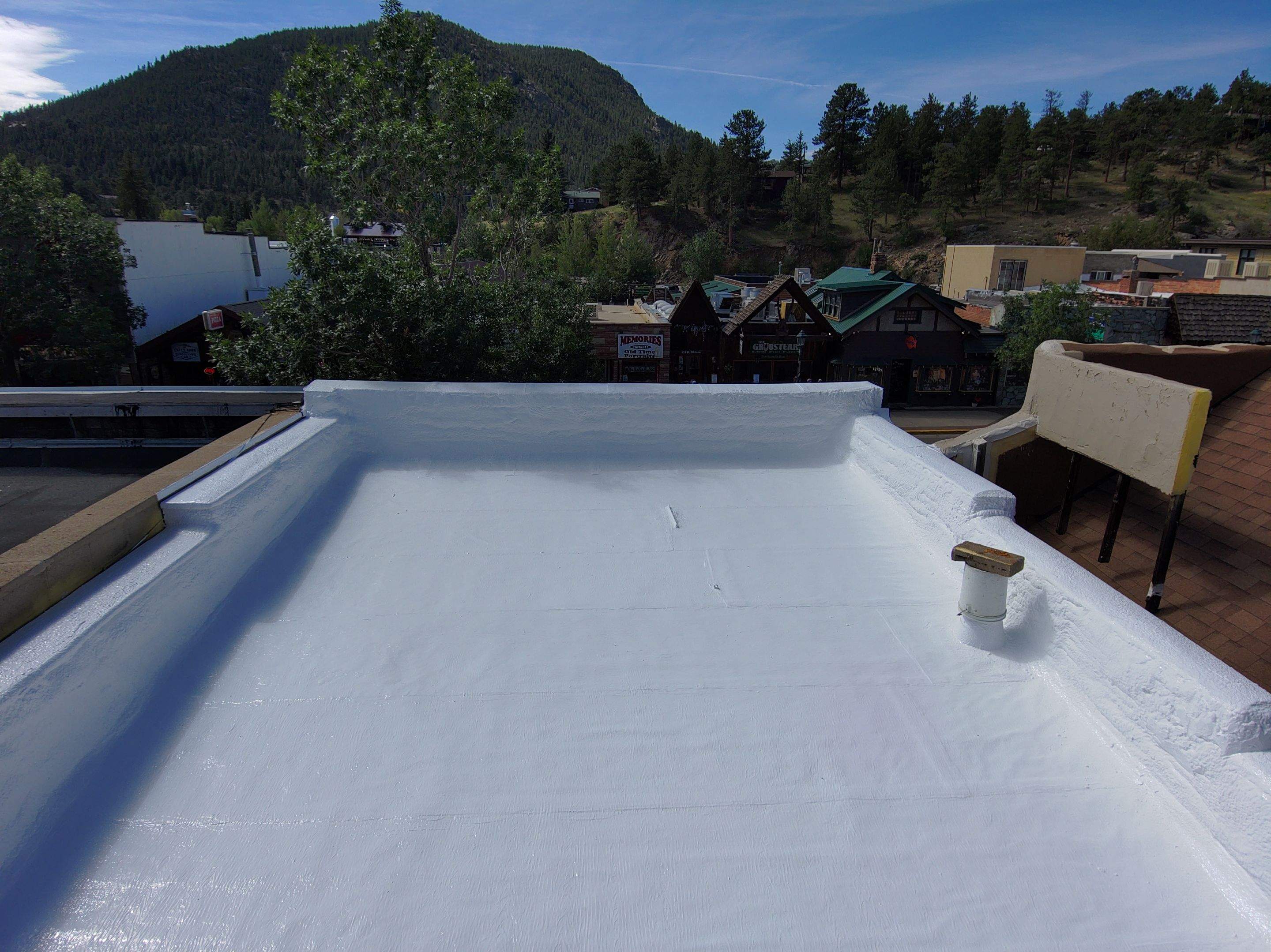 Estes Park "The Taffy Shop" Before & After Gaco Coating by Blue Peaks Roofing LLC