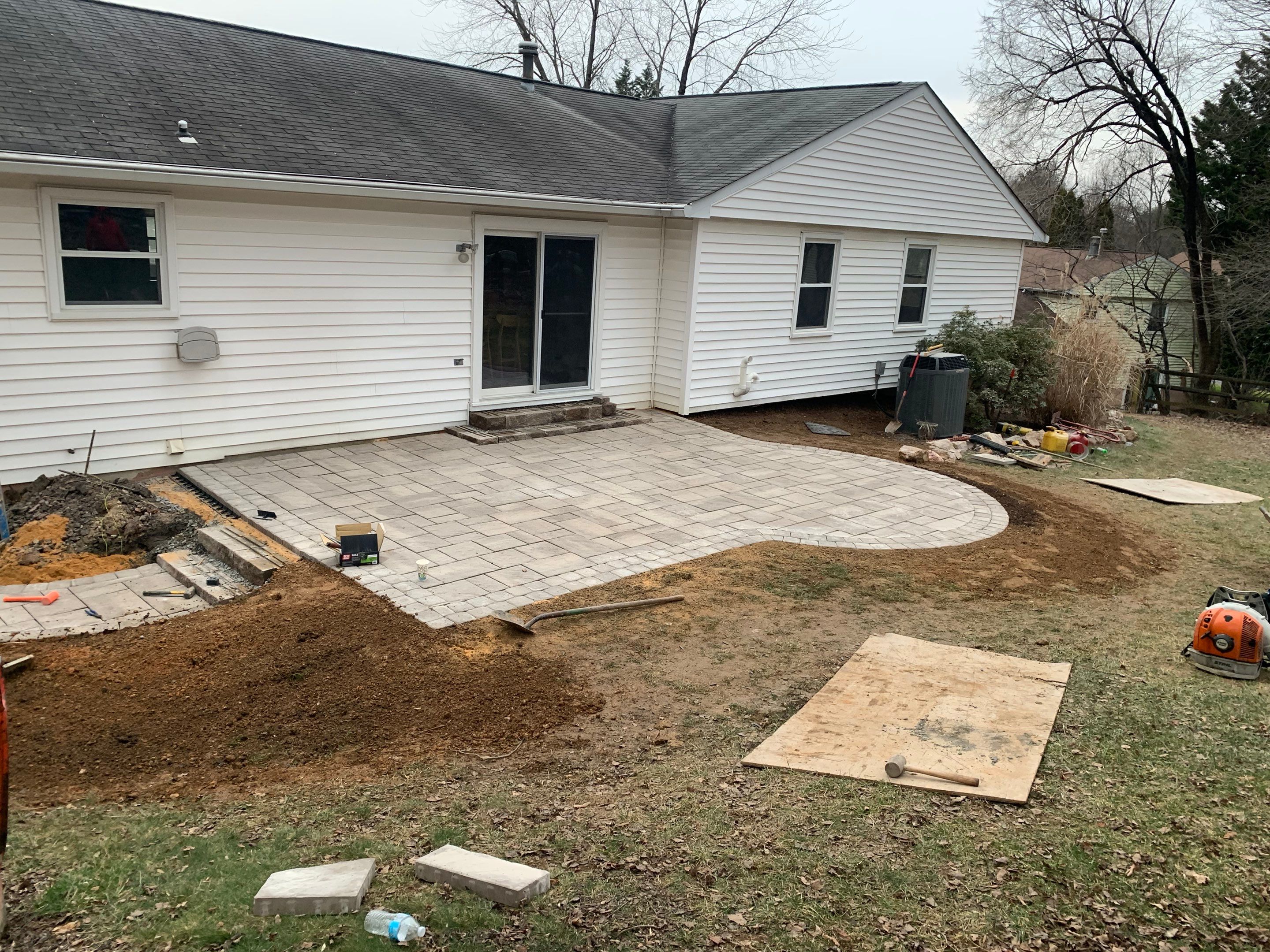 Backyard Transformation using Techo-Bloc Pavers by The Smet Companies, LLC