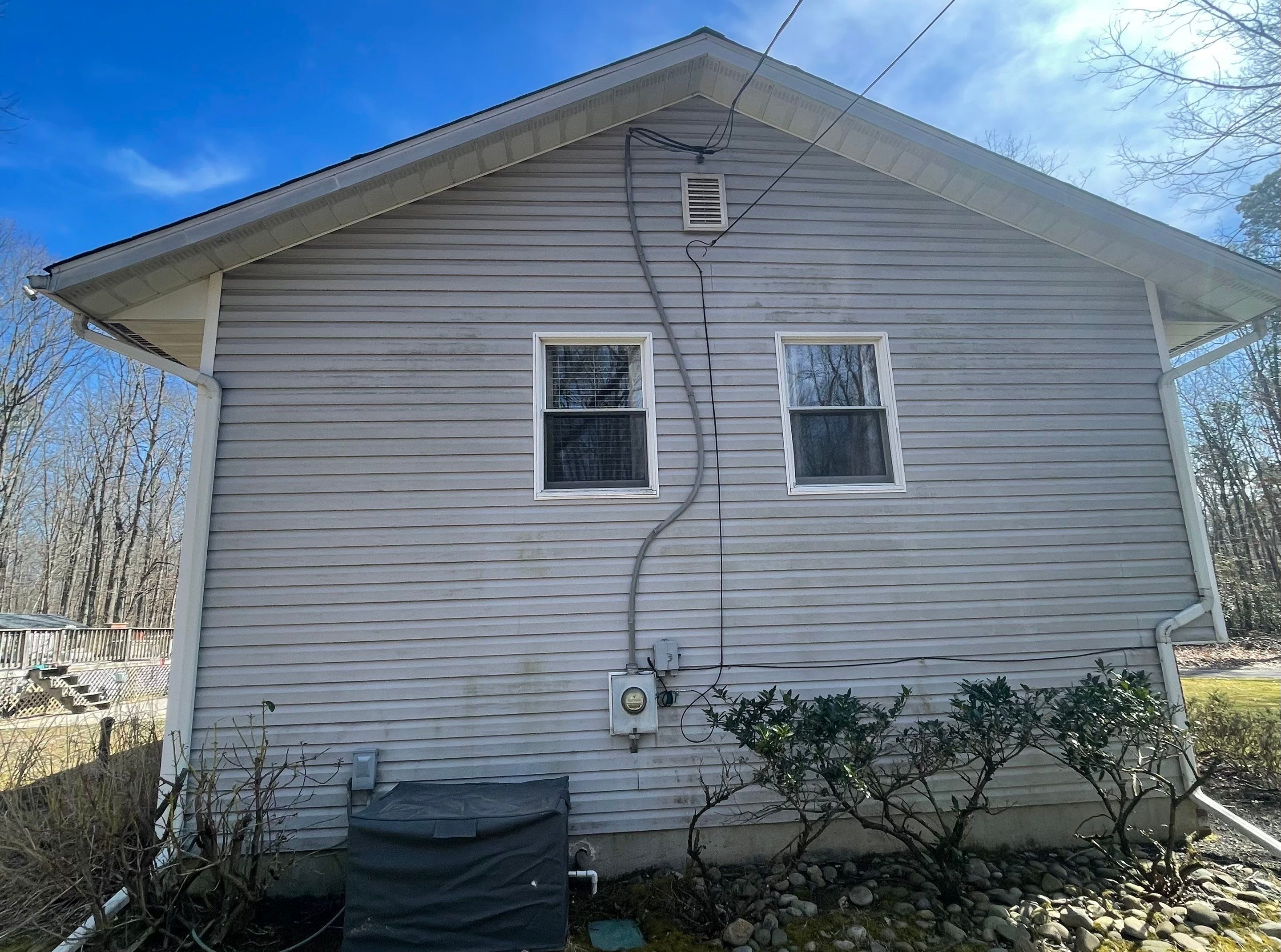 Pressure treated wood deck cleaned by SJ Exterior