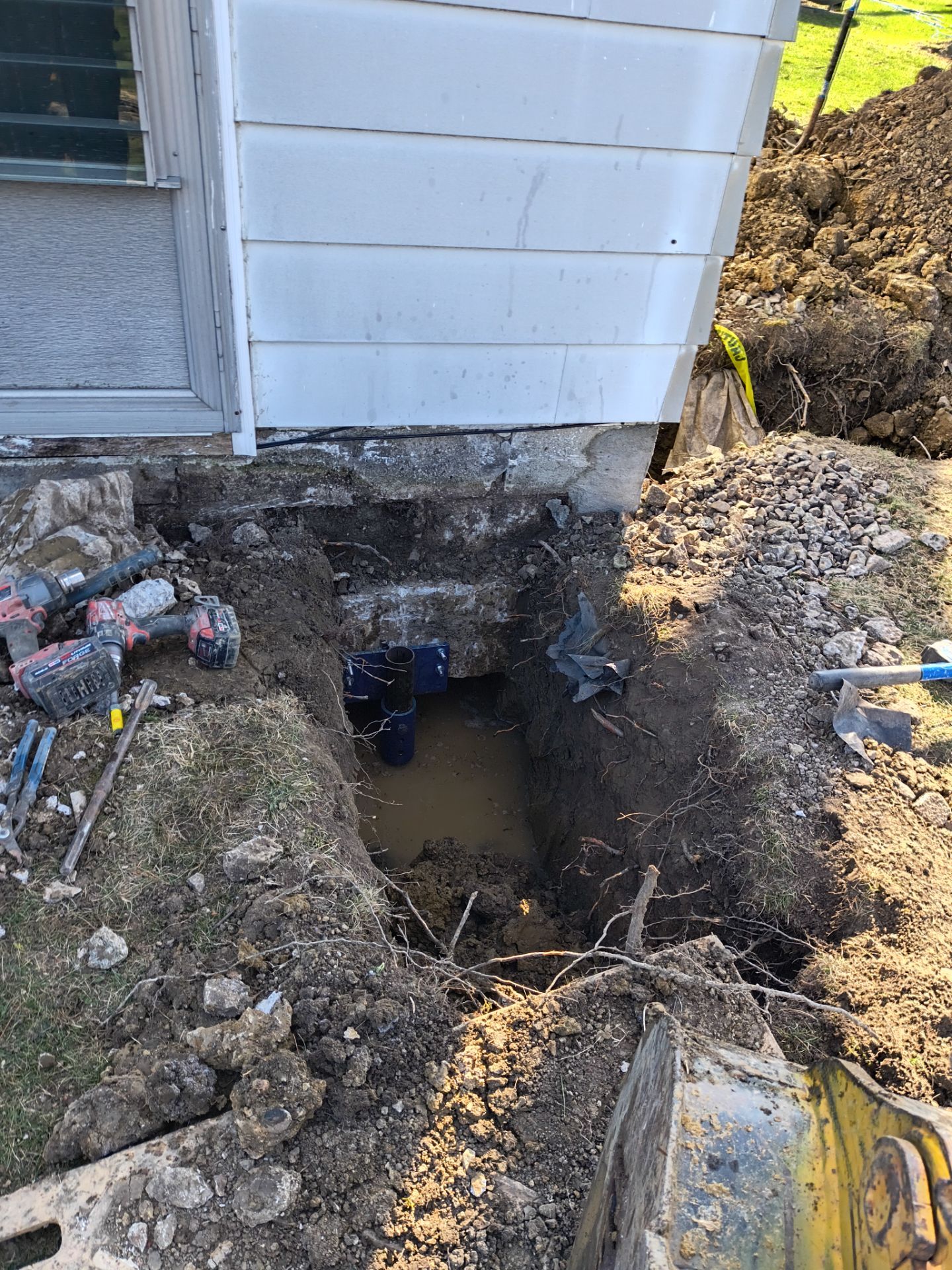 Helical Piers & Parge Coating by Toledo Basement Repair 