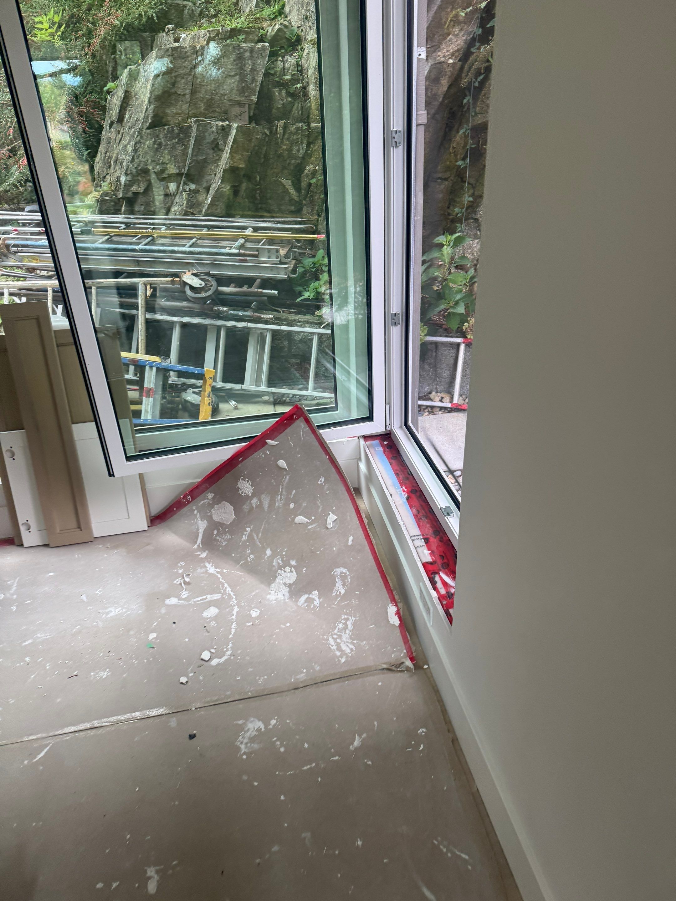 West Vancouver Custom Millwork: Heat Pump Trim & Window Finishing by YVR Construction Group