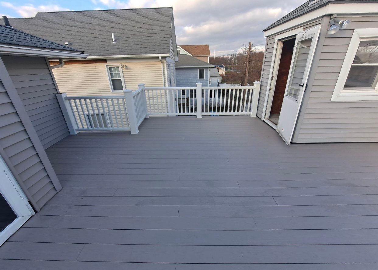 Deck Installation using trex over epdm roof by A Plus Exterior
