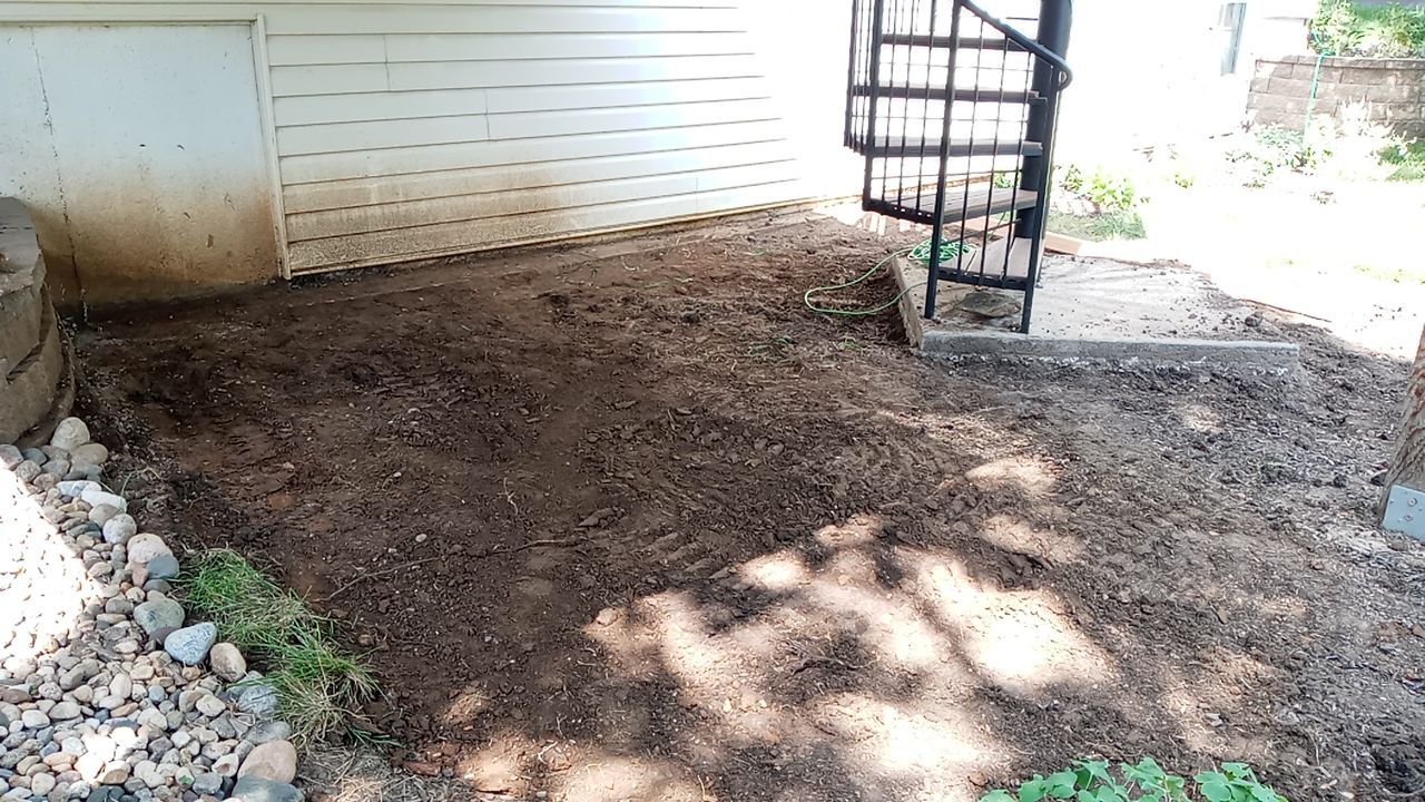 Back Yard Paver Patio by LAND ESCAPES LLC