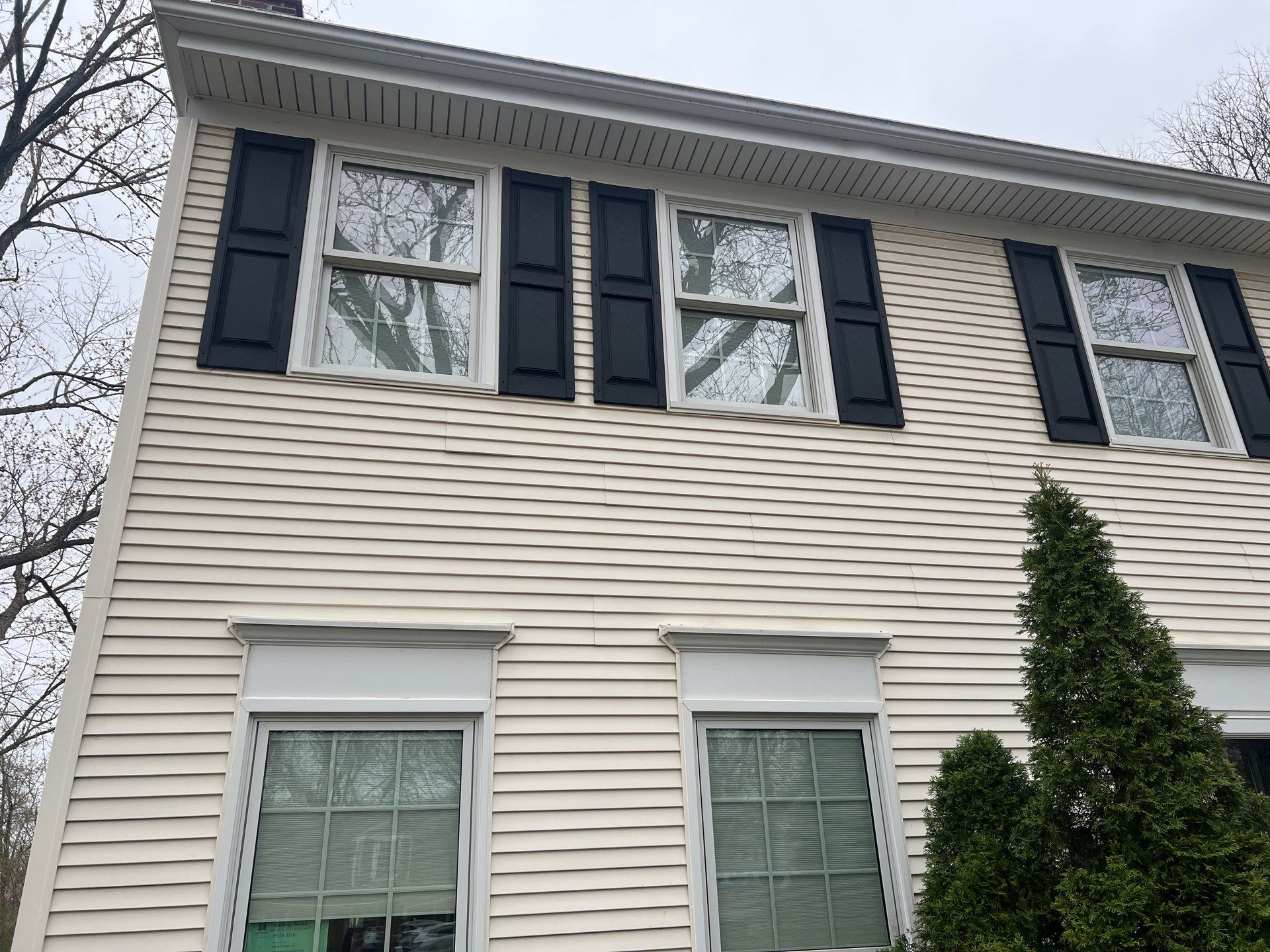 Housewashing  using Algaecide, soft wash soap by Northern Power Washing LLC.