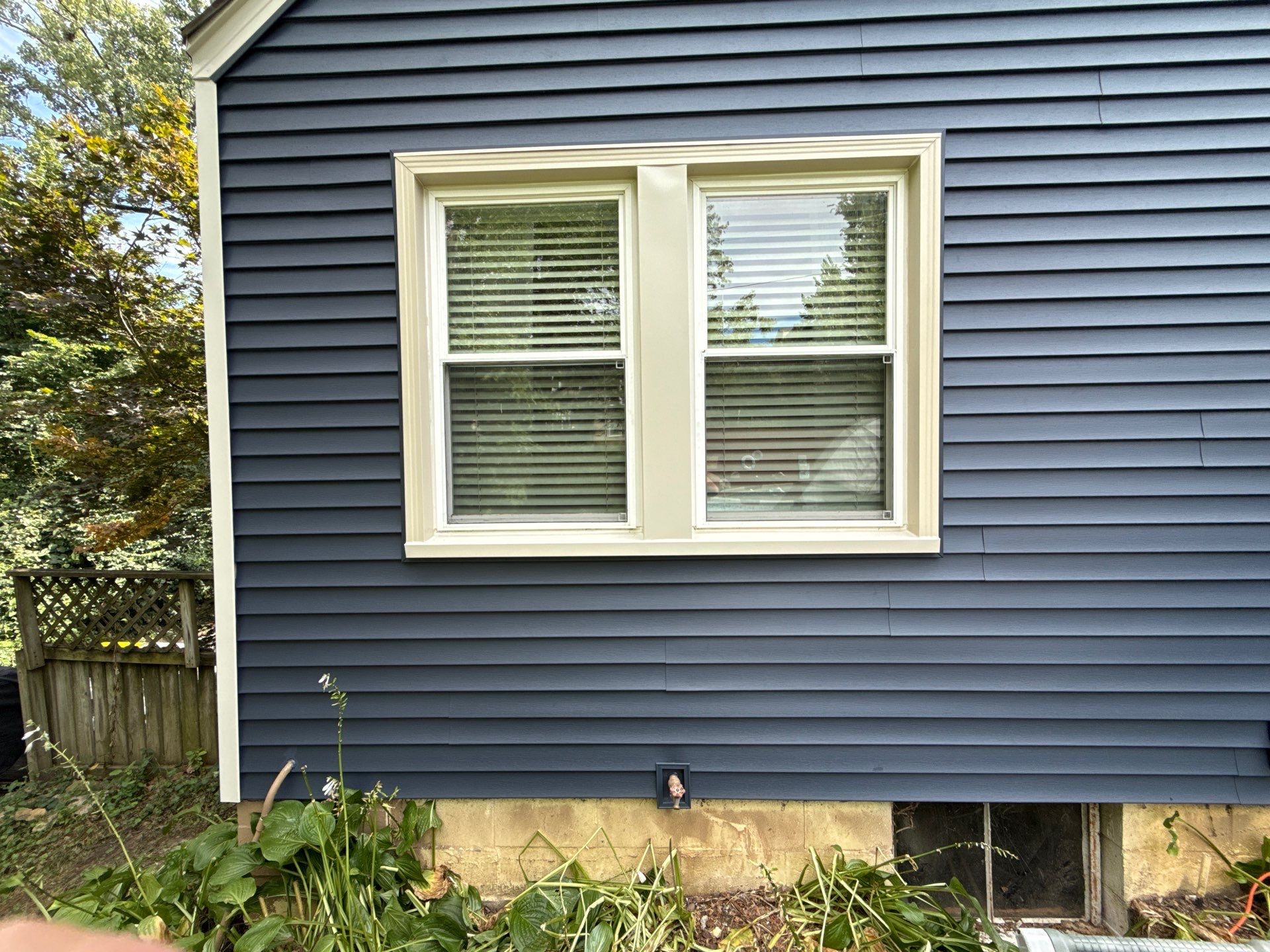 Kansas City Indigo Insulated Craneboard Siding and Window Replacement Project in Kansas City by EEC Windows, Siding & Roofing