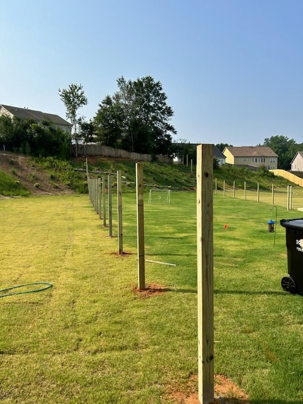 Fence Installation of Capped Wood Privacy by Titans of Timber Fence & Stain