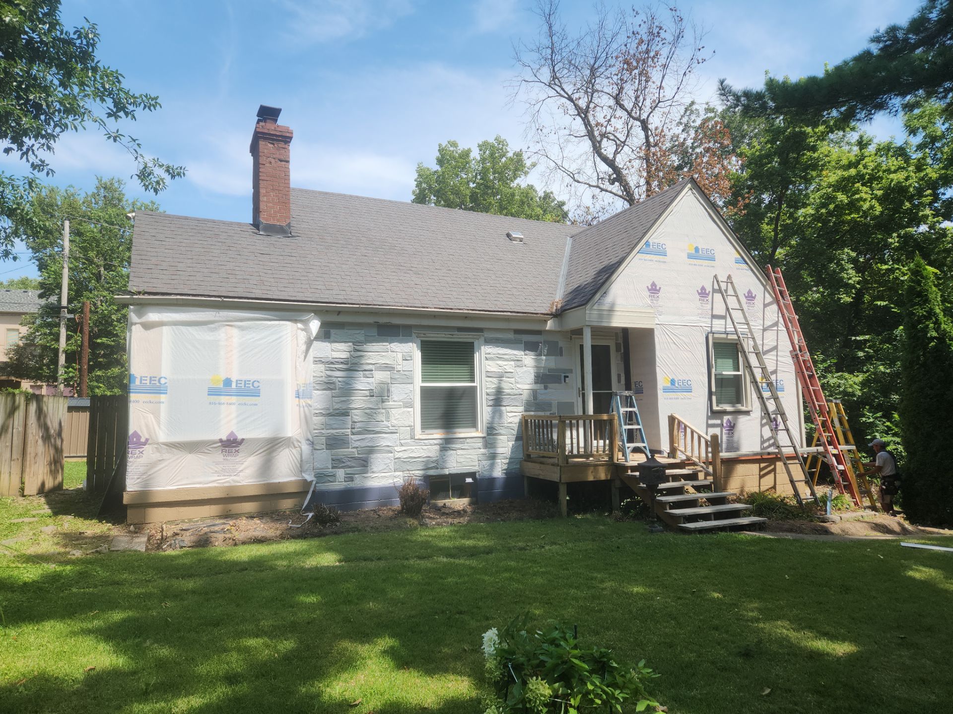 Kansas City Indigo Insulated Craneboard Siding and Window Replacement Project in Kansas City by EEC Windows, Siding & Roofing