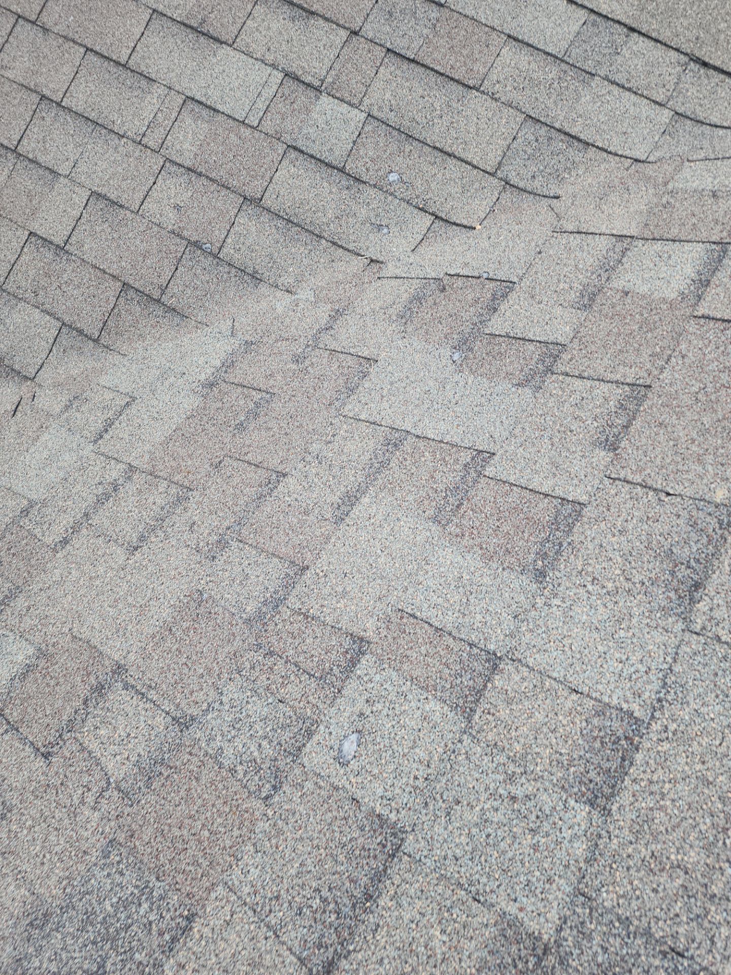 Hail Damage using Owen's Corning Duration (Lifetime) Shingles by Roof Repair Company