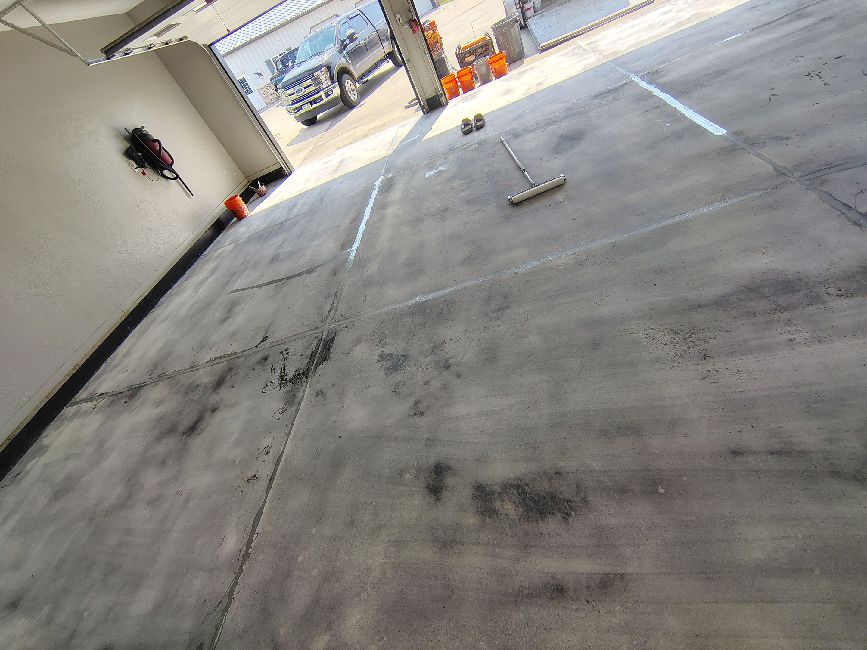 Garage Concrete Floor Coating and Crack Repair in Onawa by Select Painting, Coatings & Garage Cabinets