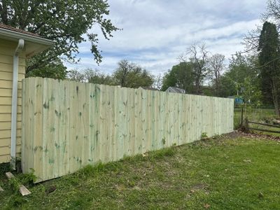 Pressure-Treated Wood Privacy Fence Installation in Waterloo