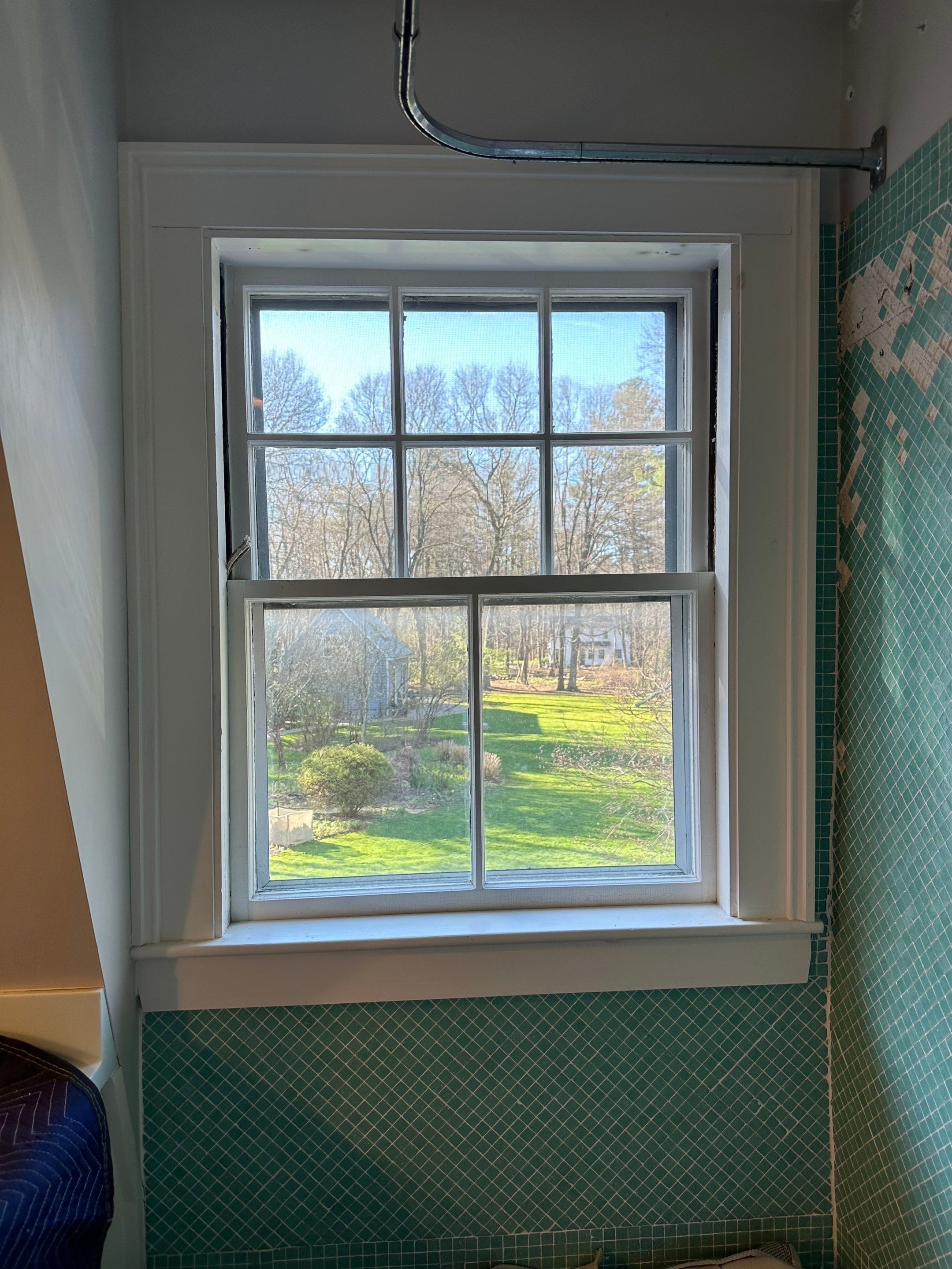White cedar shingles and windows in Wayland, MA by UBrothers Construction