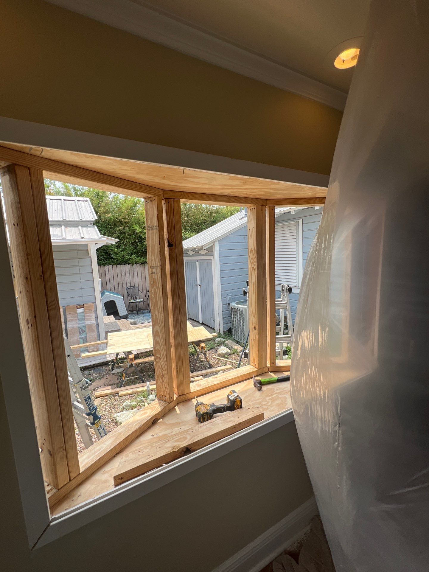 Installing Windows on a Submarine  by Bayfront Roofing and Construction
