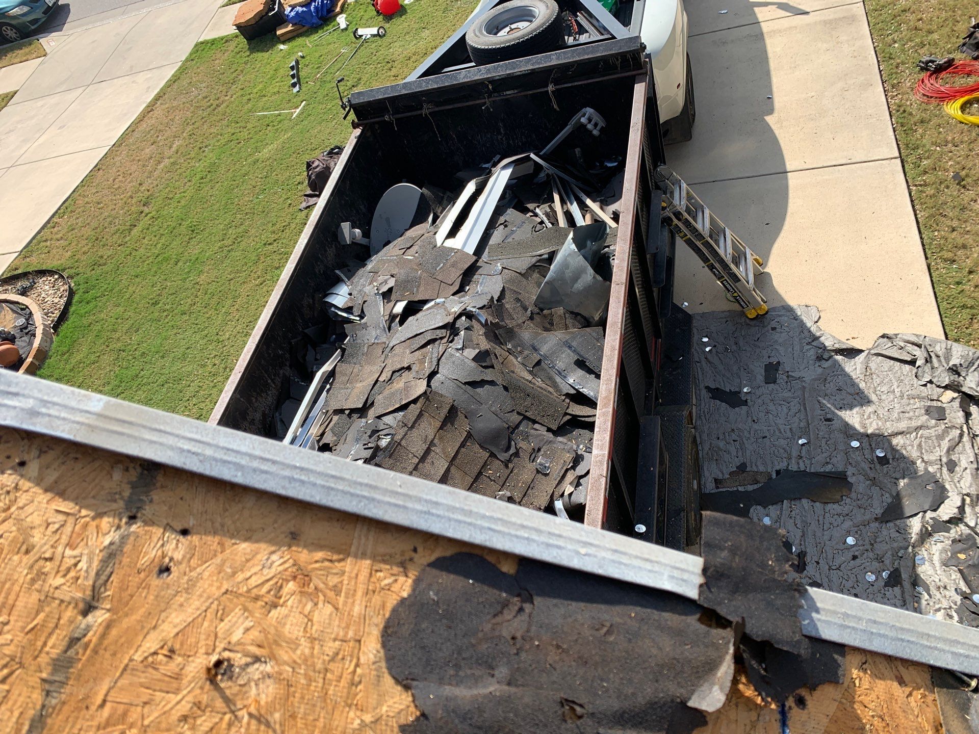 Hutto Residential Roofing Replacement with OSB Sheathing and Trim Repair by Caliber Restoration LLC