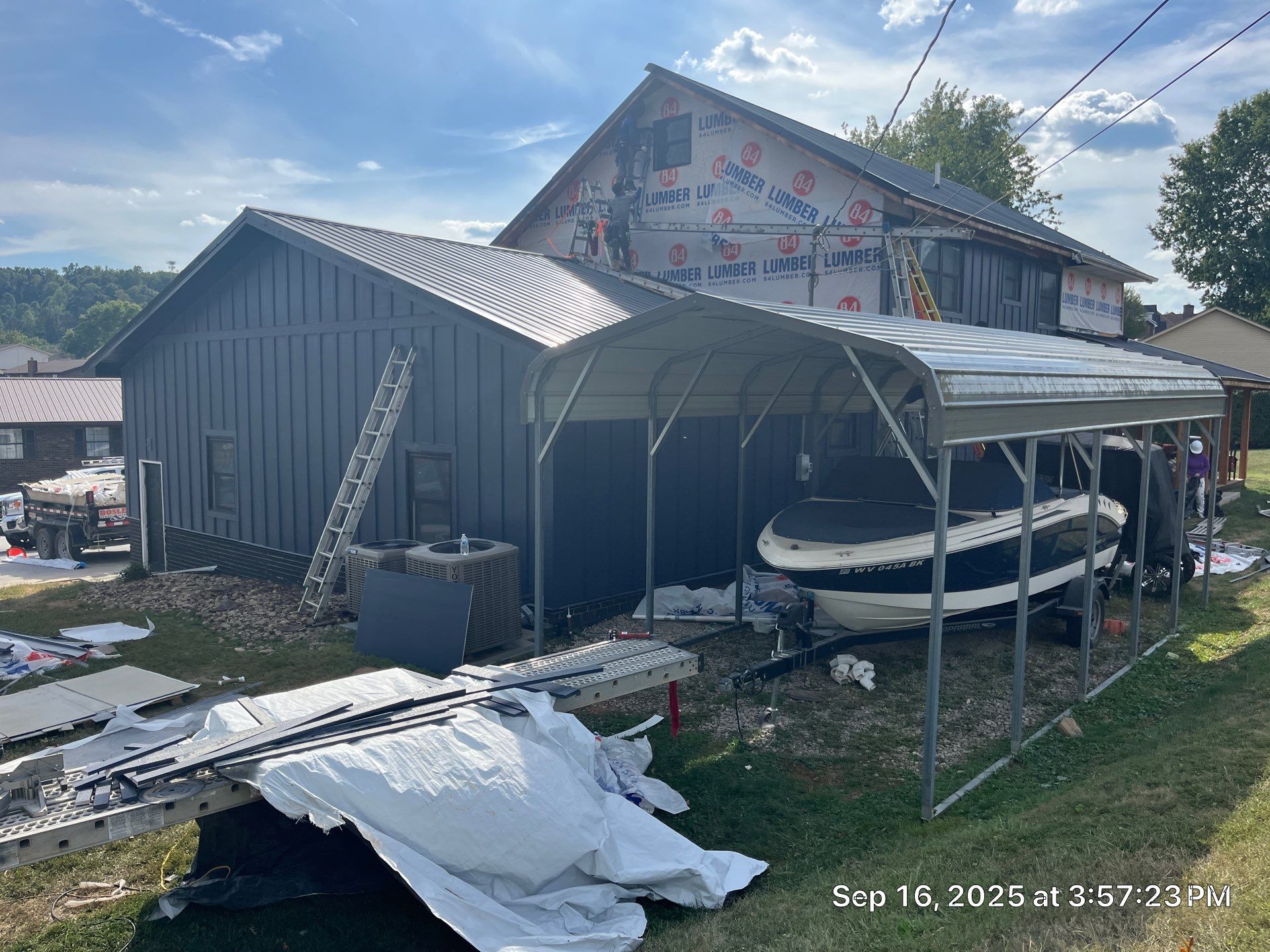 Siding and Metal Roof by Fahey Roofing + Contracting