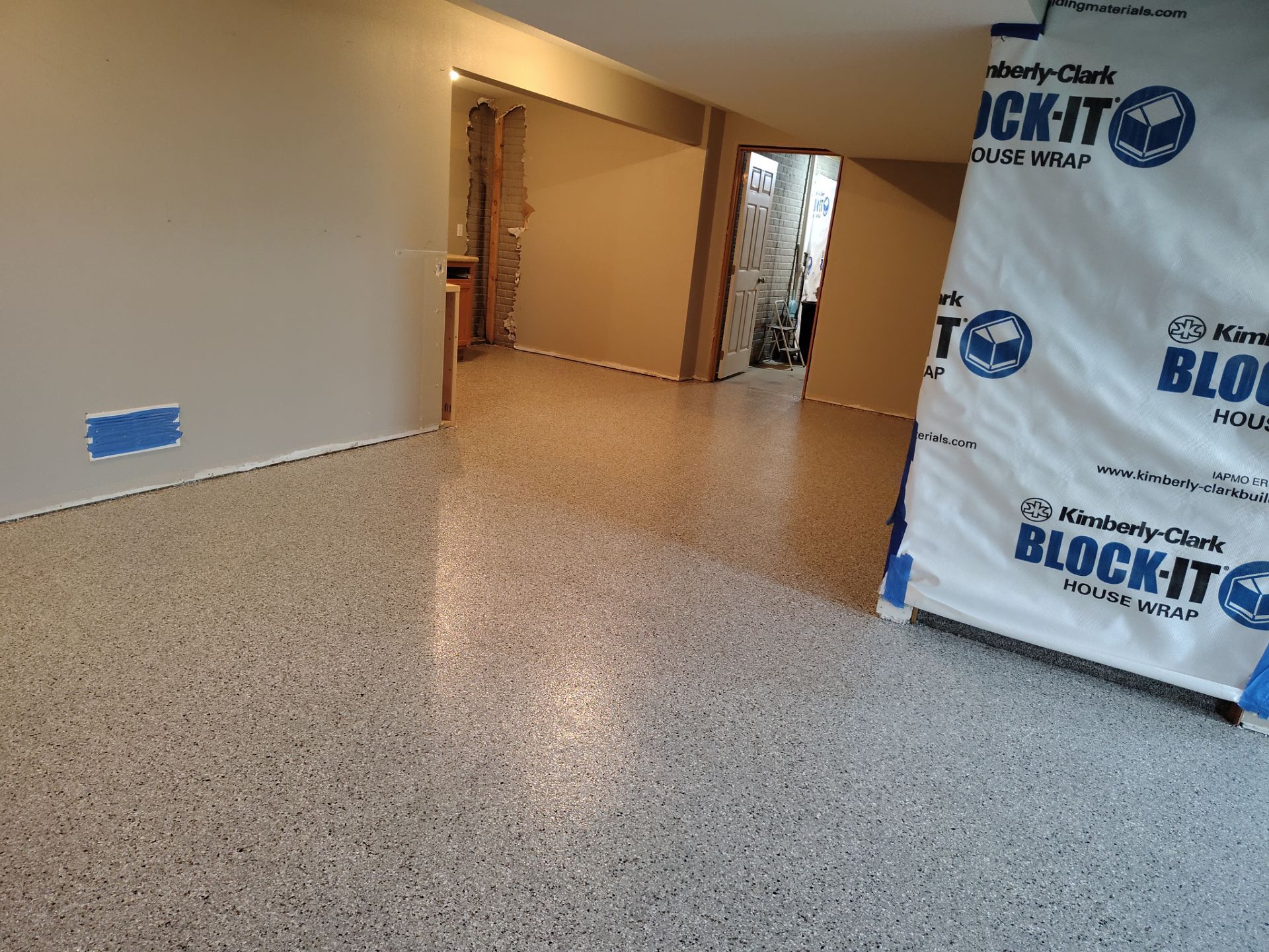 Maxwell, IA Coyote Flake Garage and Basement by Revival Concrete Coatings