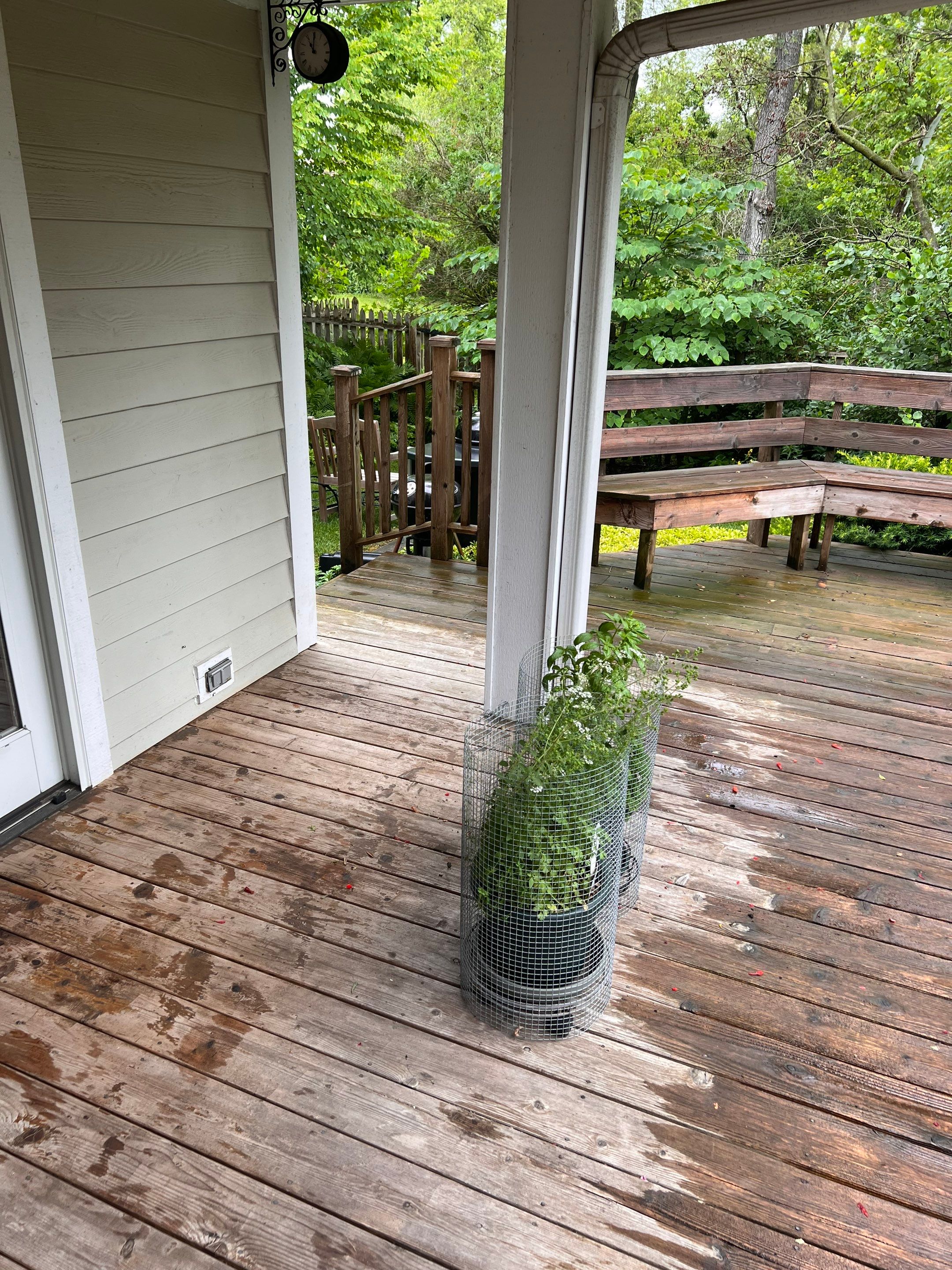 Wood deck cleaning, board replacement and staining by Northern Power Washing LLC.