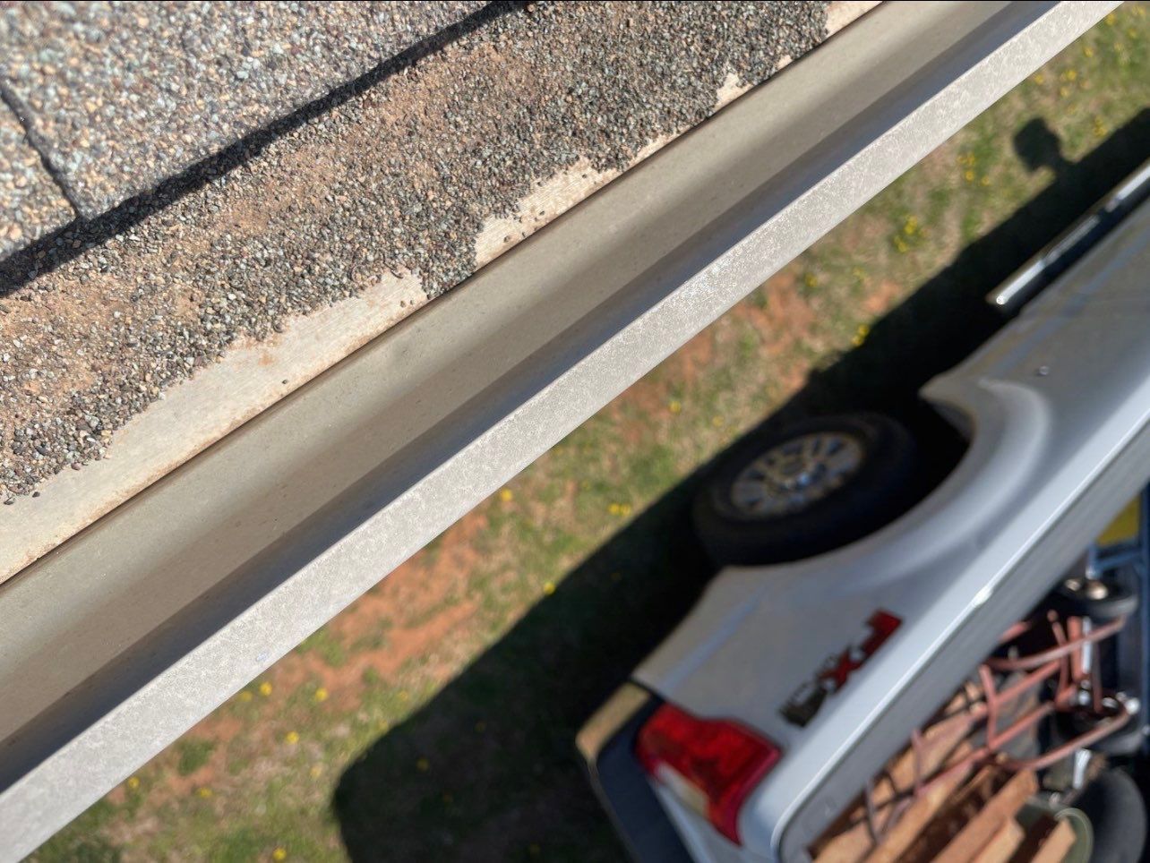 Hail Damage on a Roofing System by Icon Roofing And Construction 