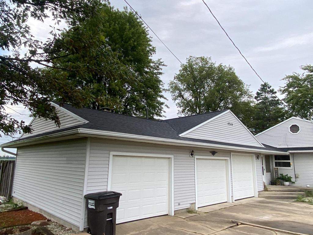 Storm damage roof replacement by Nitro Roofing and Construction
