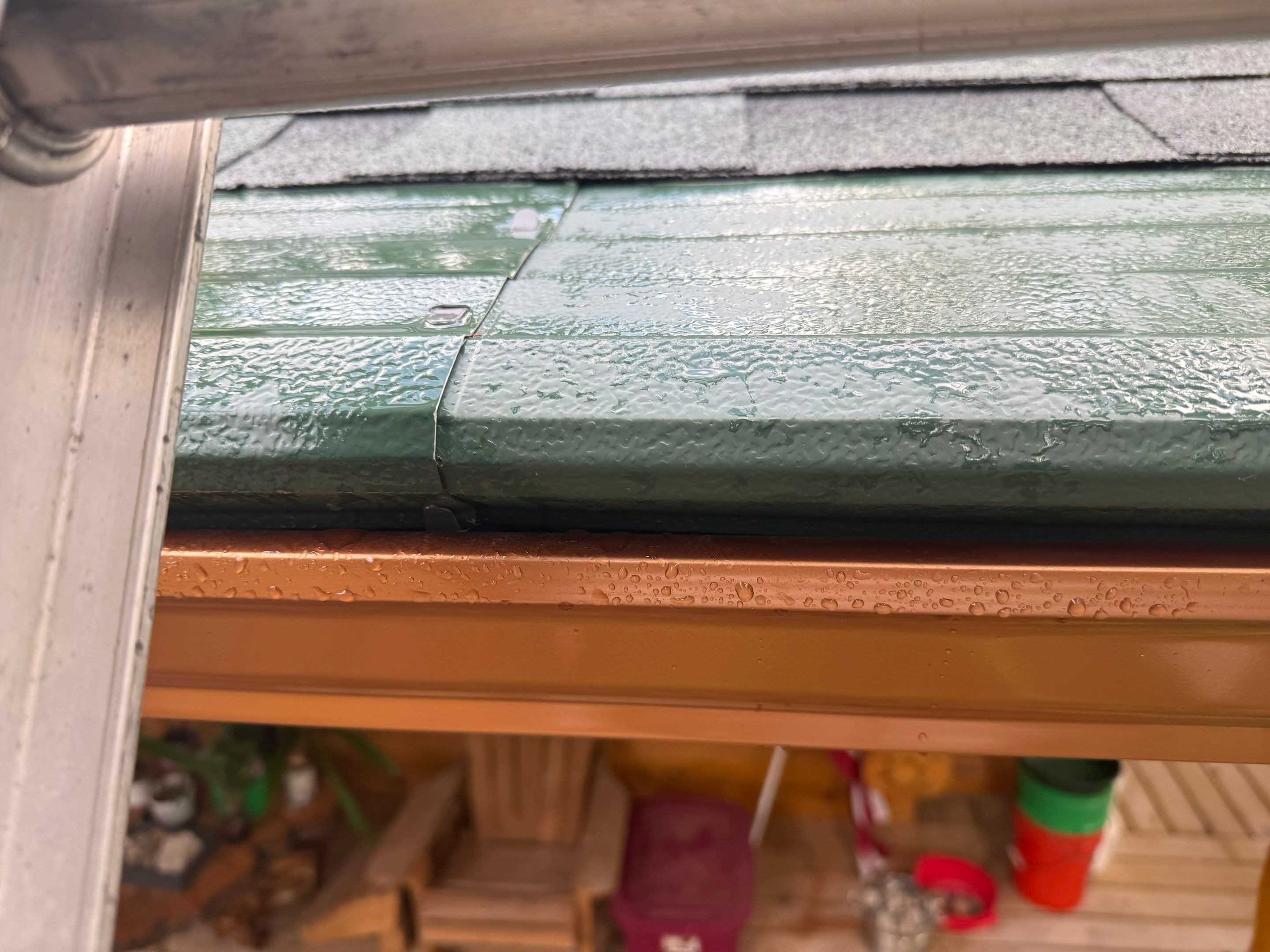 Copper Gutter and Gutter Helmet Installation on Williamsburg Log Cabin by Rainbow Seamless Systems