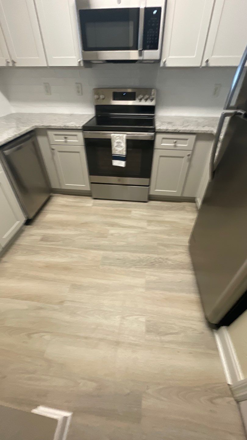 Home Remodel using LVP Flooring and Cabinets by HandyMangum