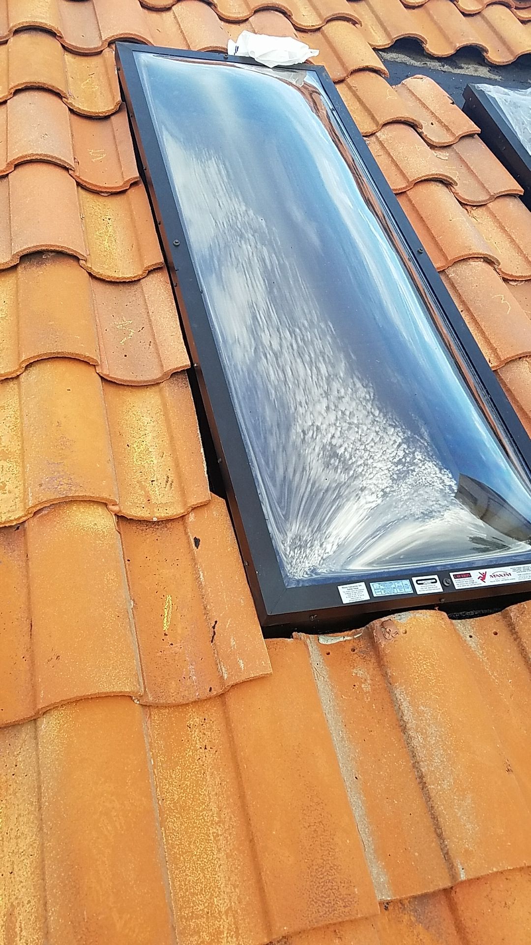 Tile Roof Repair and Skylight Replacement in Palm Beach Gardens by Aastro Roofing
