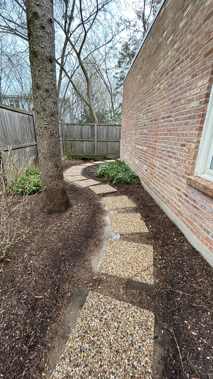 Flagstone stepper cleaning by Northern Power Washing LLC.
