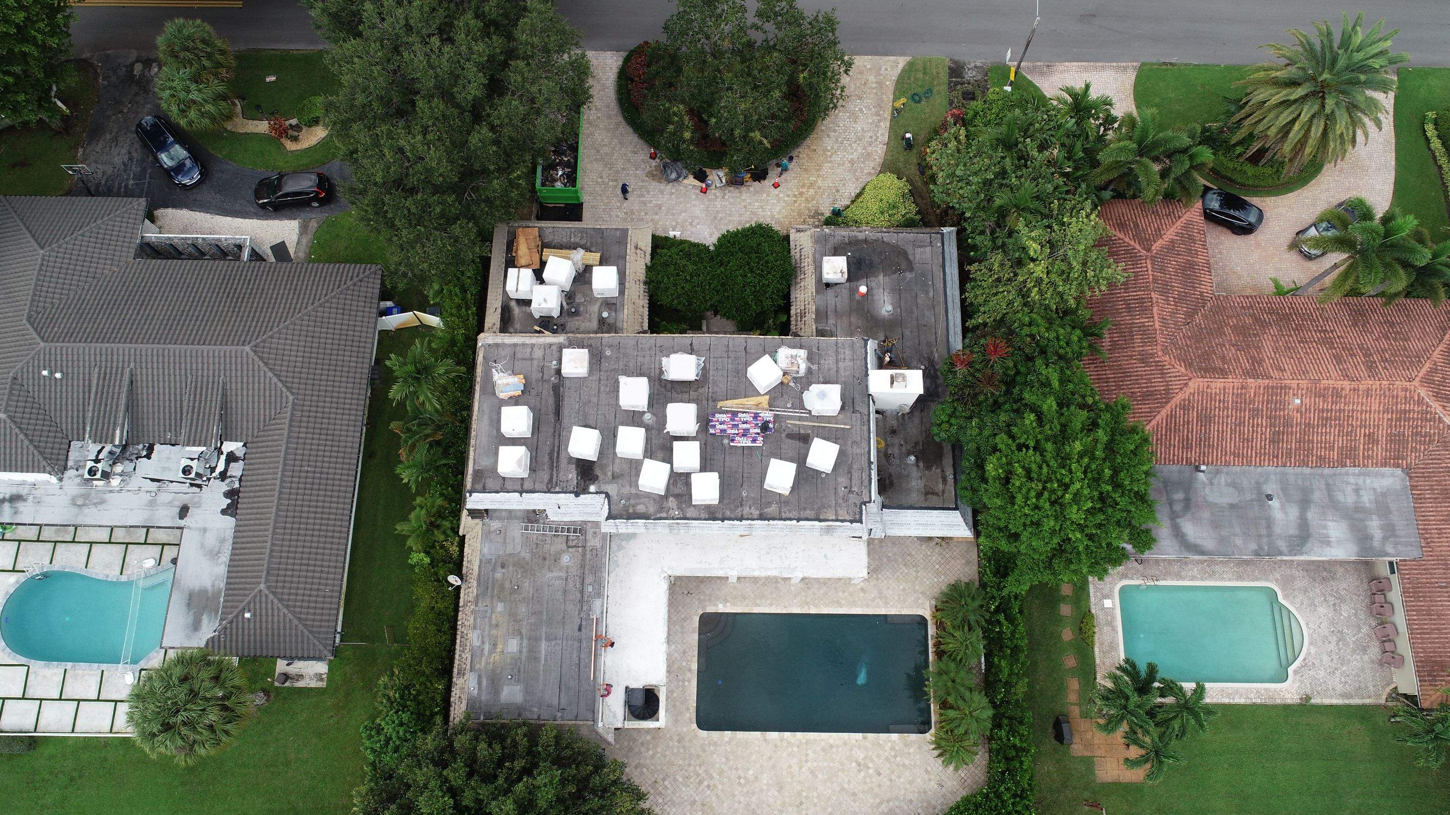 Amazing TPO flat deck re-roof with Eagle mansard in Hollywood Florida.  by First Due Roofing