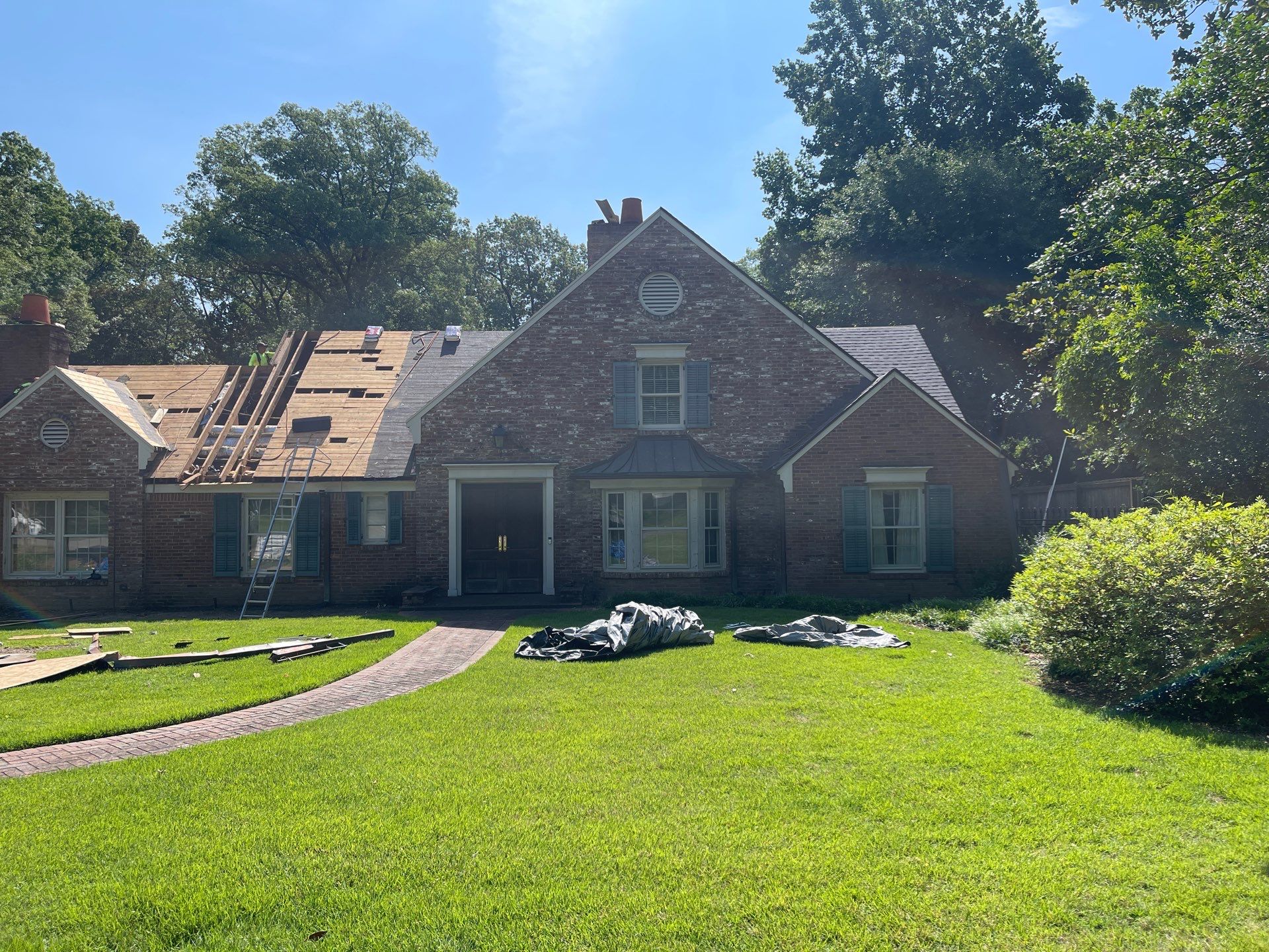 Full Roof Replacement with gutter upgrade after tree impact damage in East Memphis by Revival Roofing Services