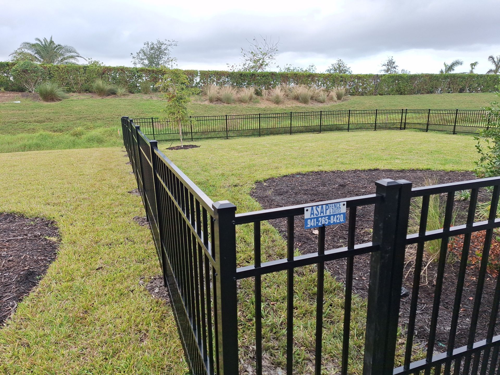Aluminum Fence Installation using 4ft 3 Rail Black Aluminum Fence by Asap fence and gates, LLC