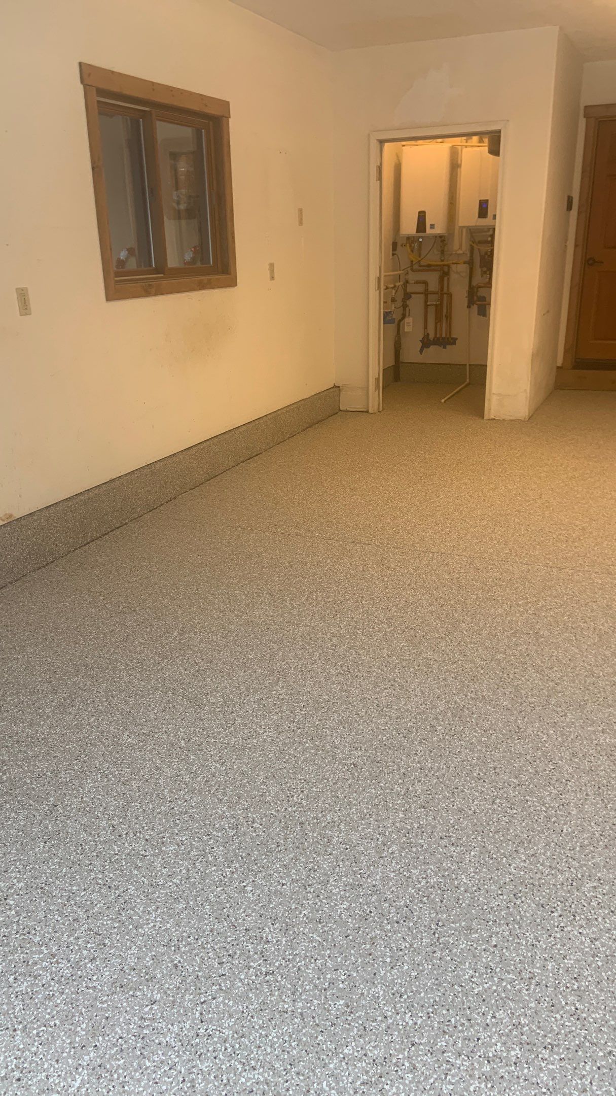 Garage Transformation using Pebble Beach by Croc Coatings, LLC