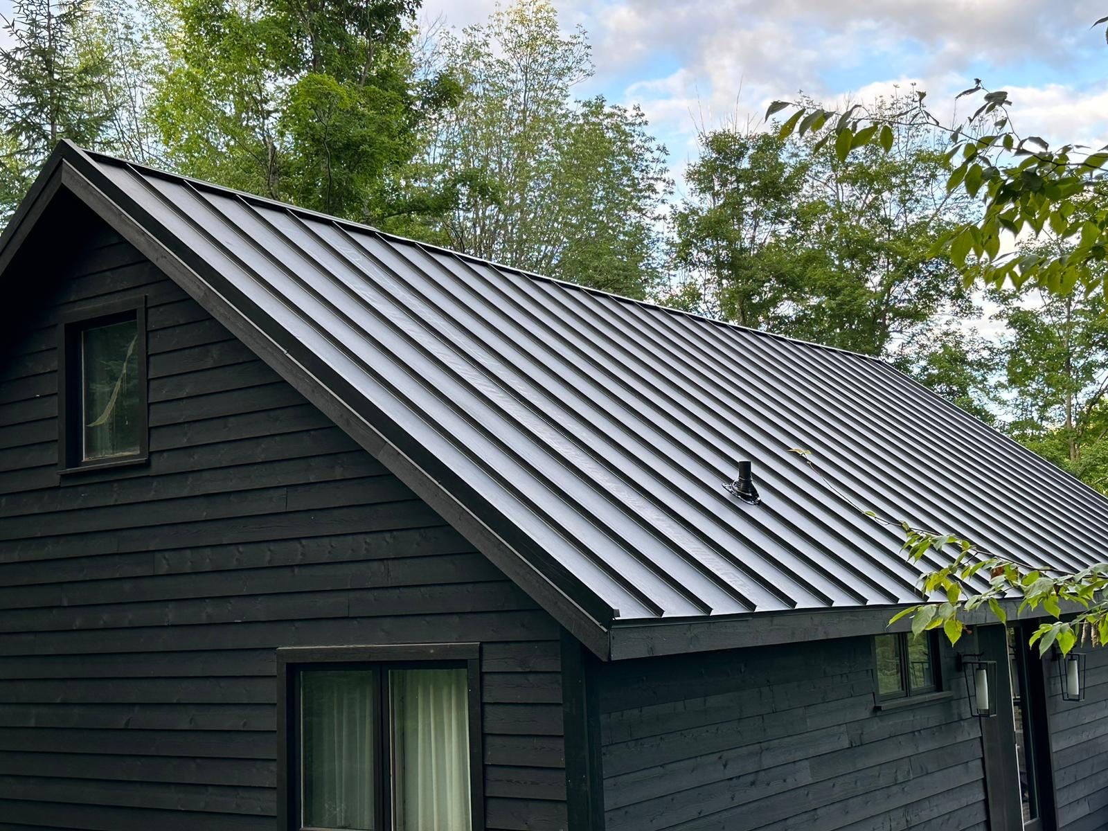 New 26 gauge standing seam roof  by Jay Carter Roofing & Sheet Metal