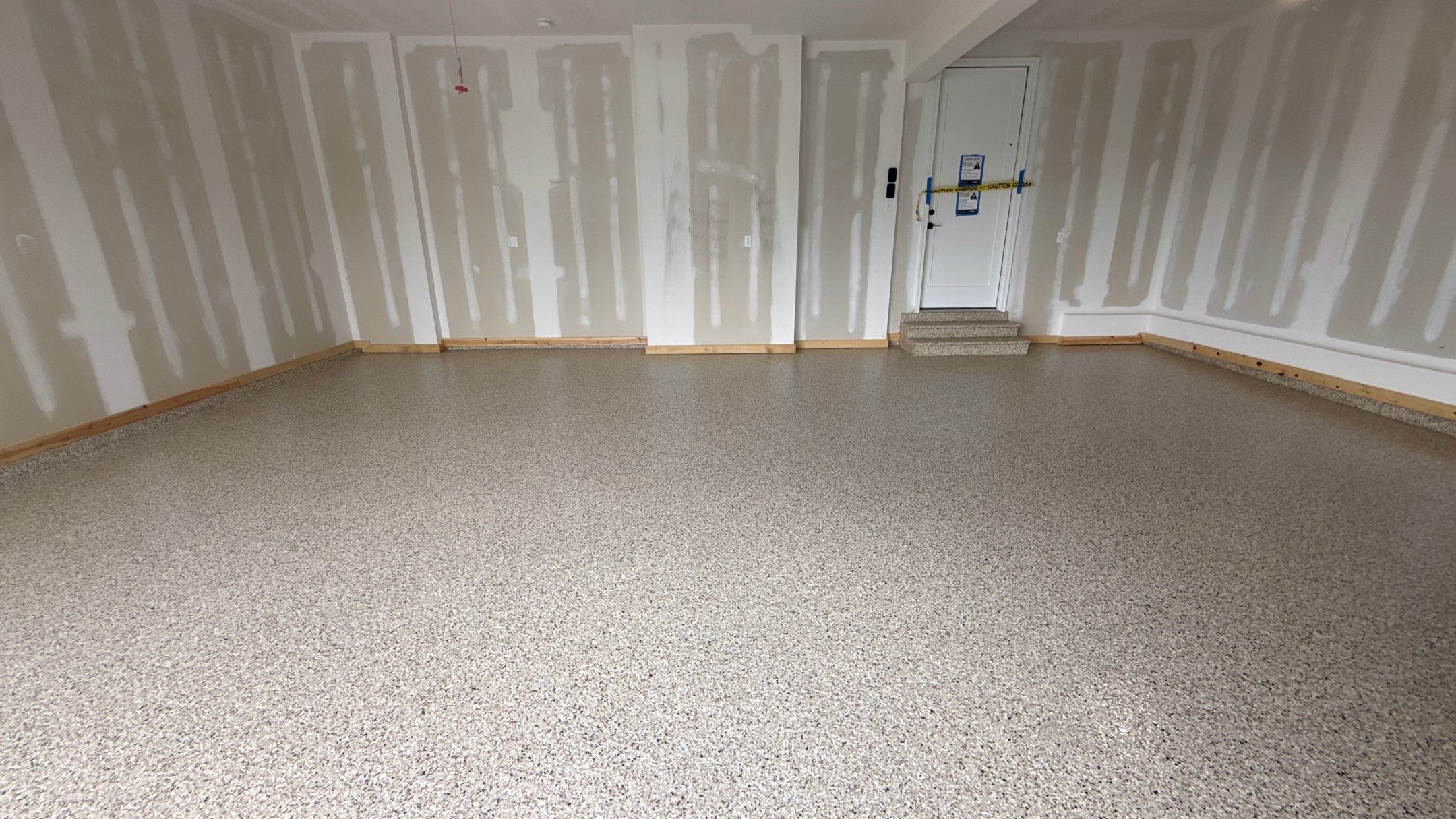 Mark Chose The Best Time To Do His Floor, Right Before Move In  by Banner Garage