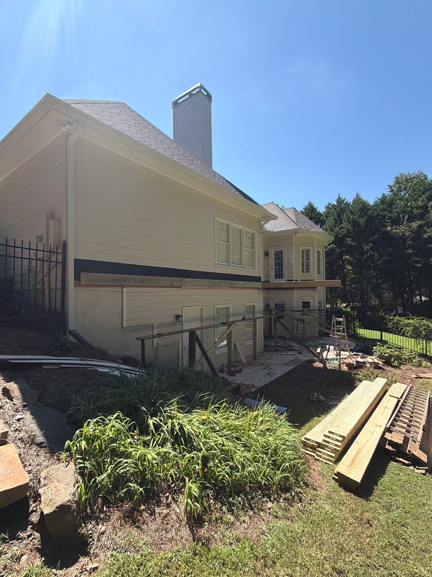 Elevated Composite Deck Replacement with Metal Railings in Smyrna by Swift Home Renovations 