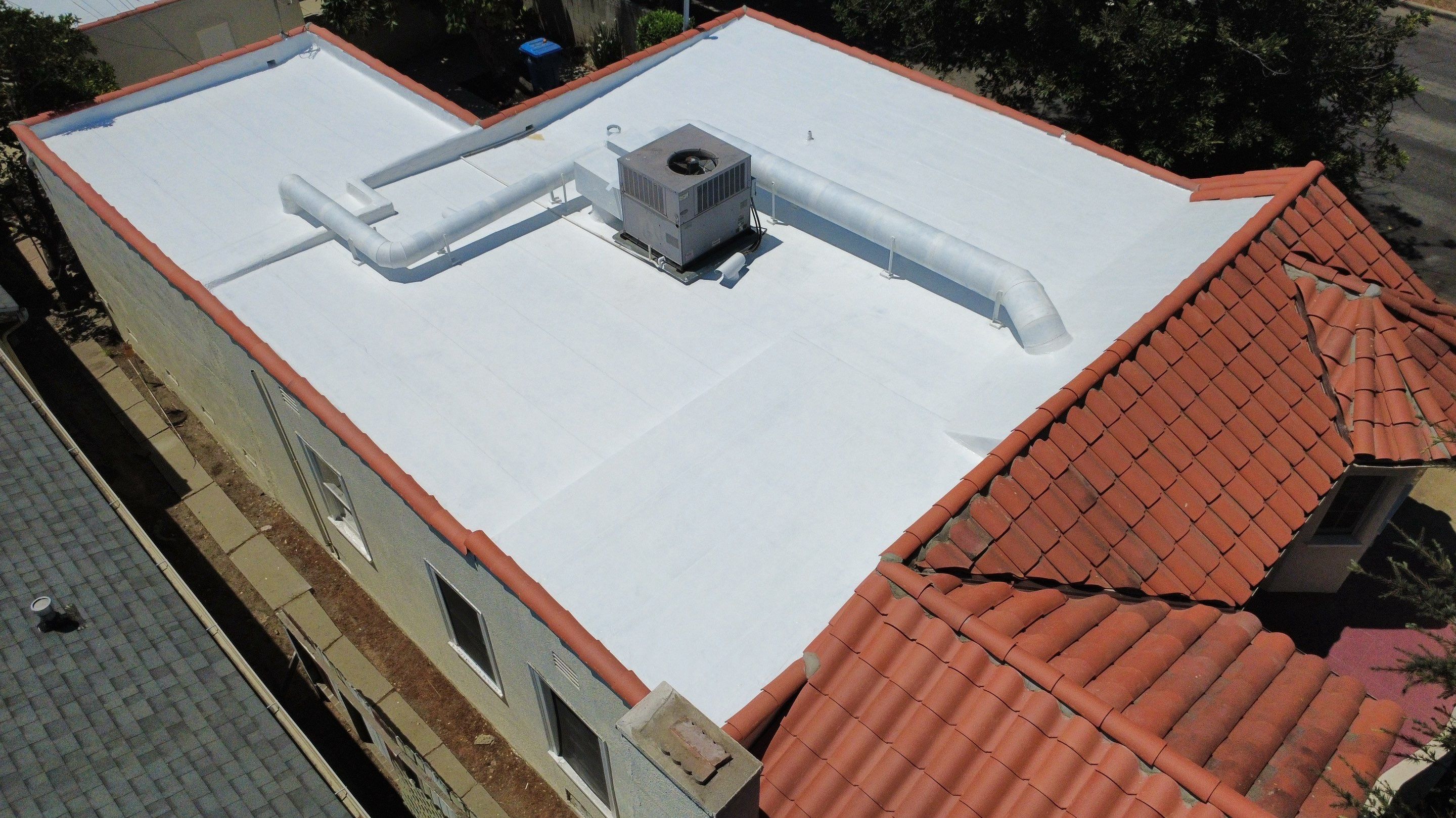 Tile Reset and Silicone Membrane Installation by Hull Brothers Roofing