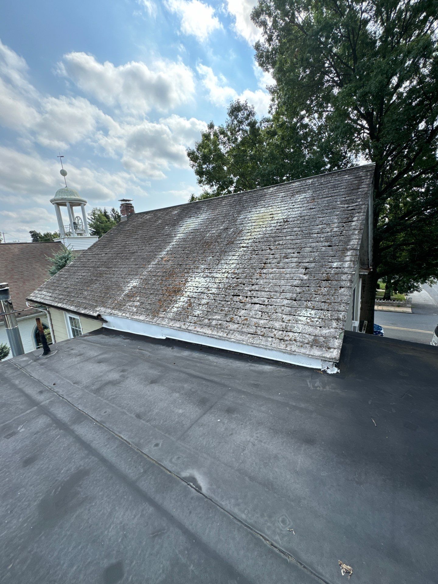 Textured Bronze Roof and Flat Membrane Installation in Hershey by Esh Builders