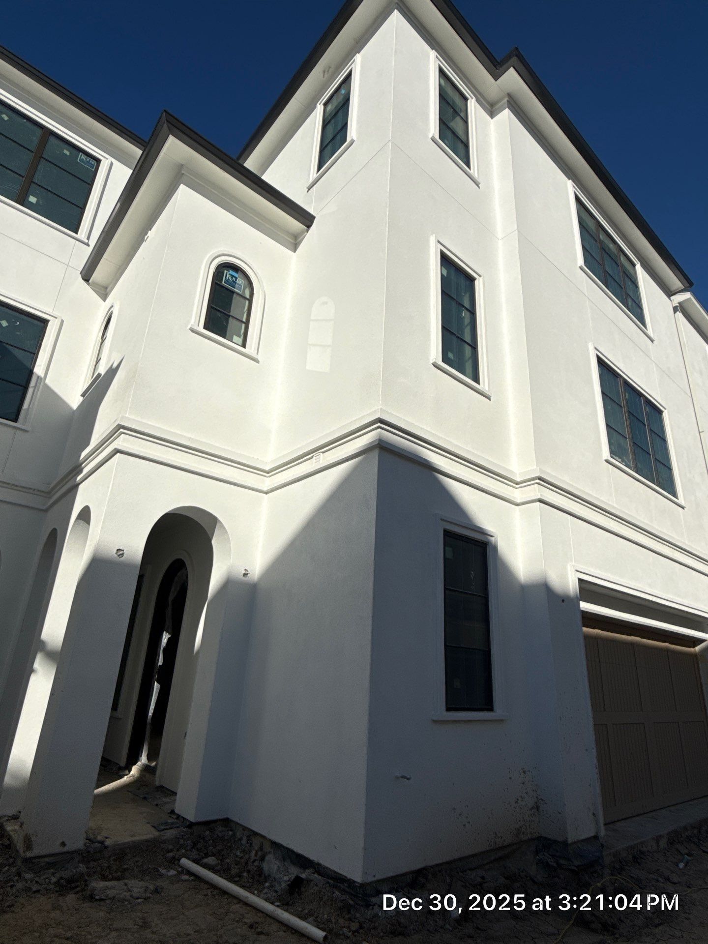 Modern Multi-Story Residential Stucco Home in Houston by Apex Conventional Stucco Llc
