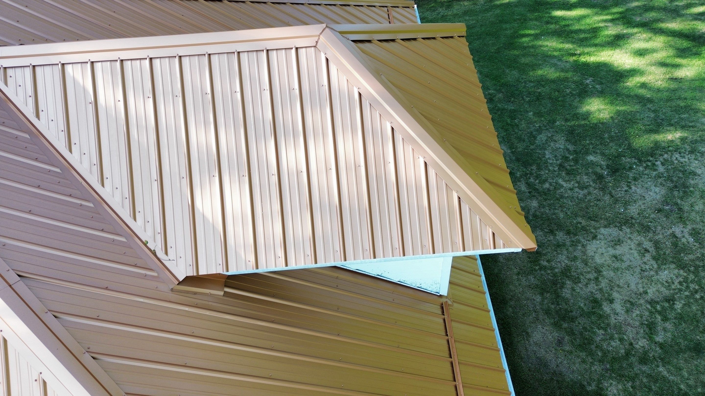 Residential Roofing Installation using Performance Panel Metal - Copper Metallic by RoofX 