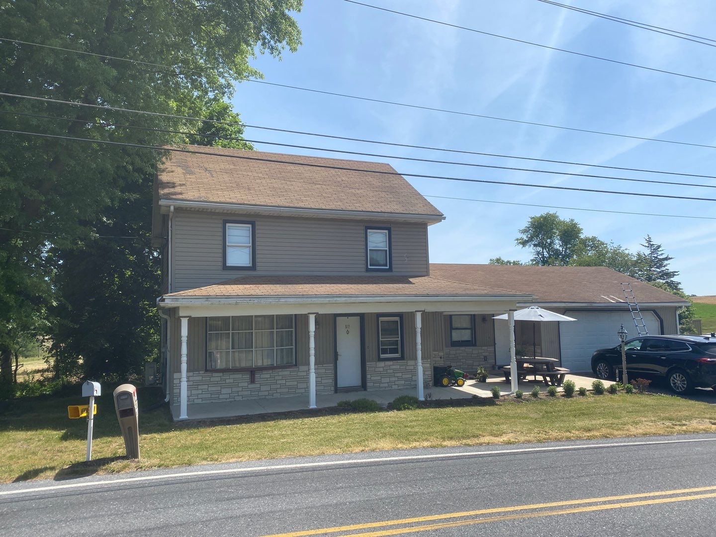 Reshingle-barkwood UHDZ- and new windows by Esh Builders