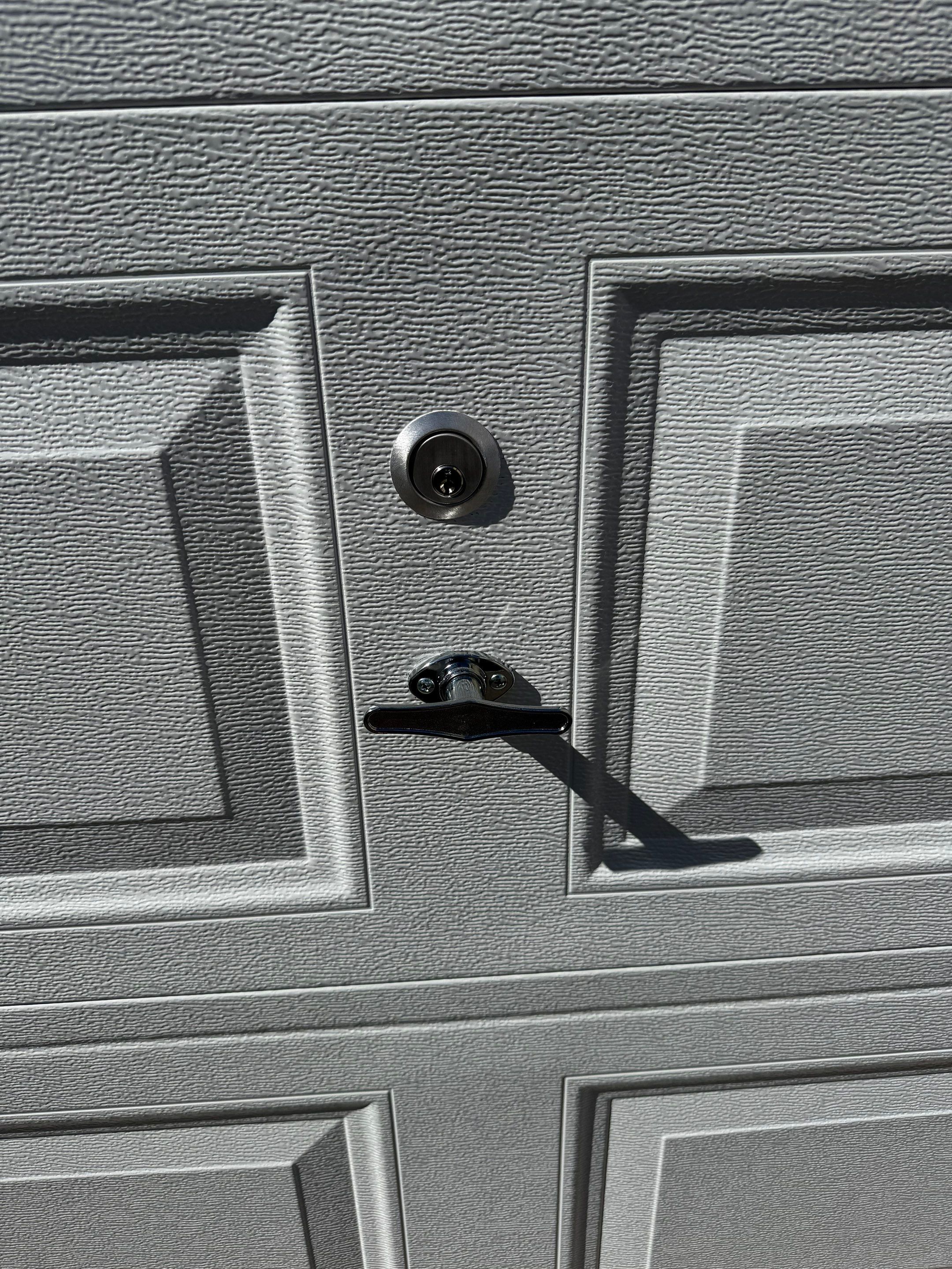 Garage Door Refresh with Improved Function & Clean Finish by DiGiorgi Roofing and Siding Inc