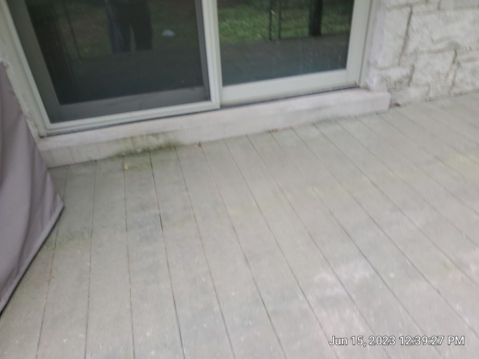 Highland Park, IL Bluestone, concrete,  Trex deck cleaning by Northern Power Washing LLC.