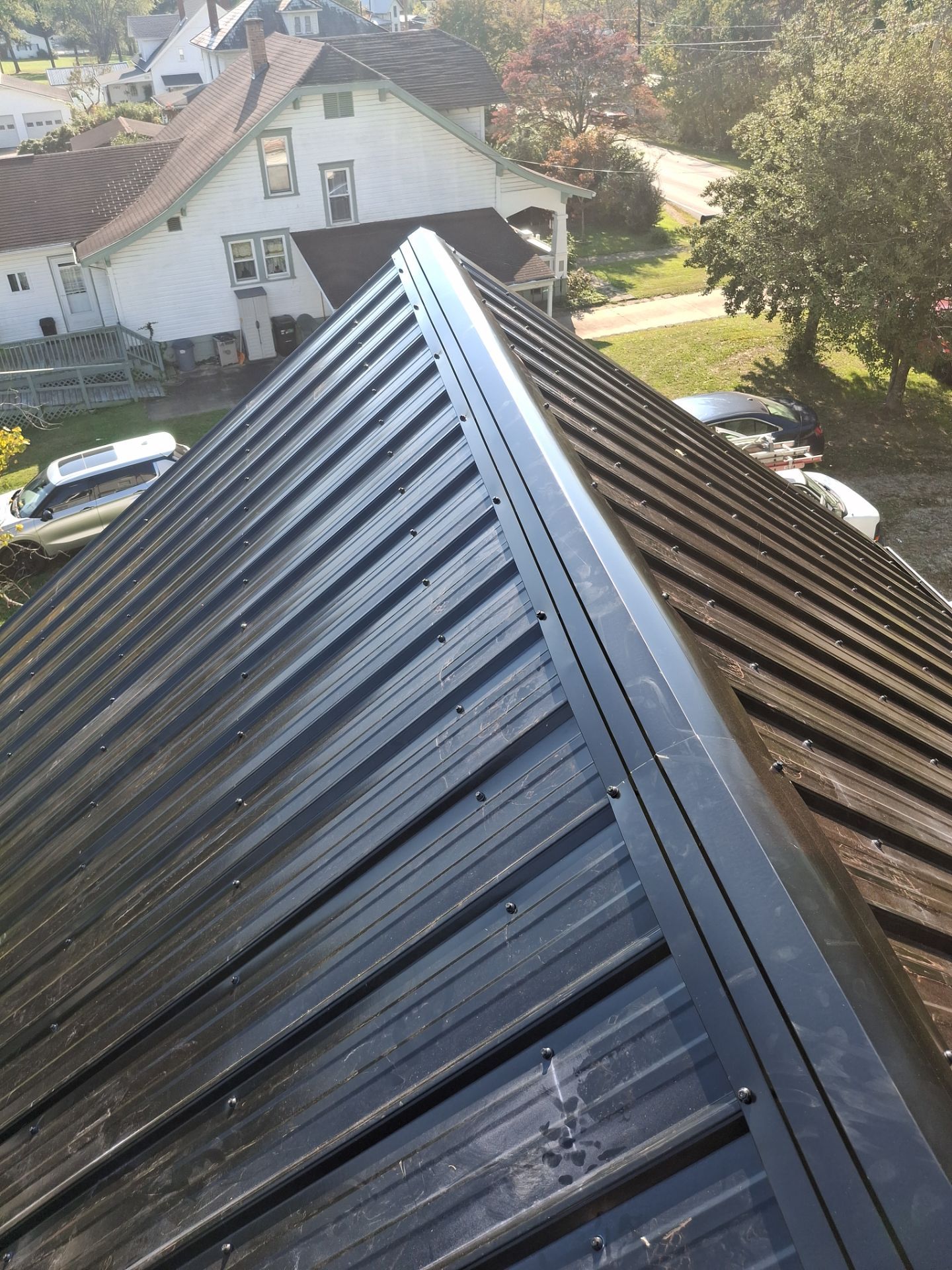 Residential Roofing Installation using Metal by Rainstoppers Roofing