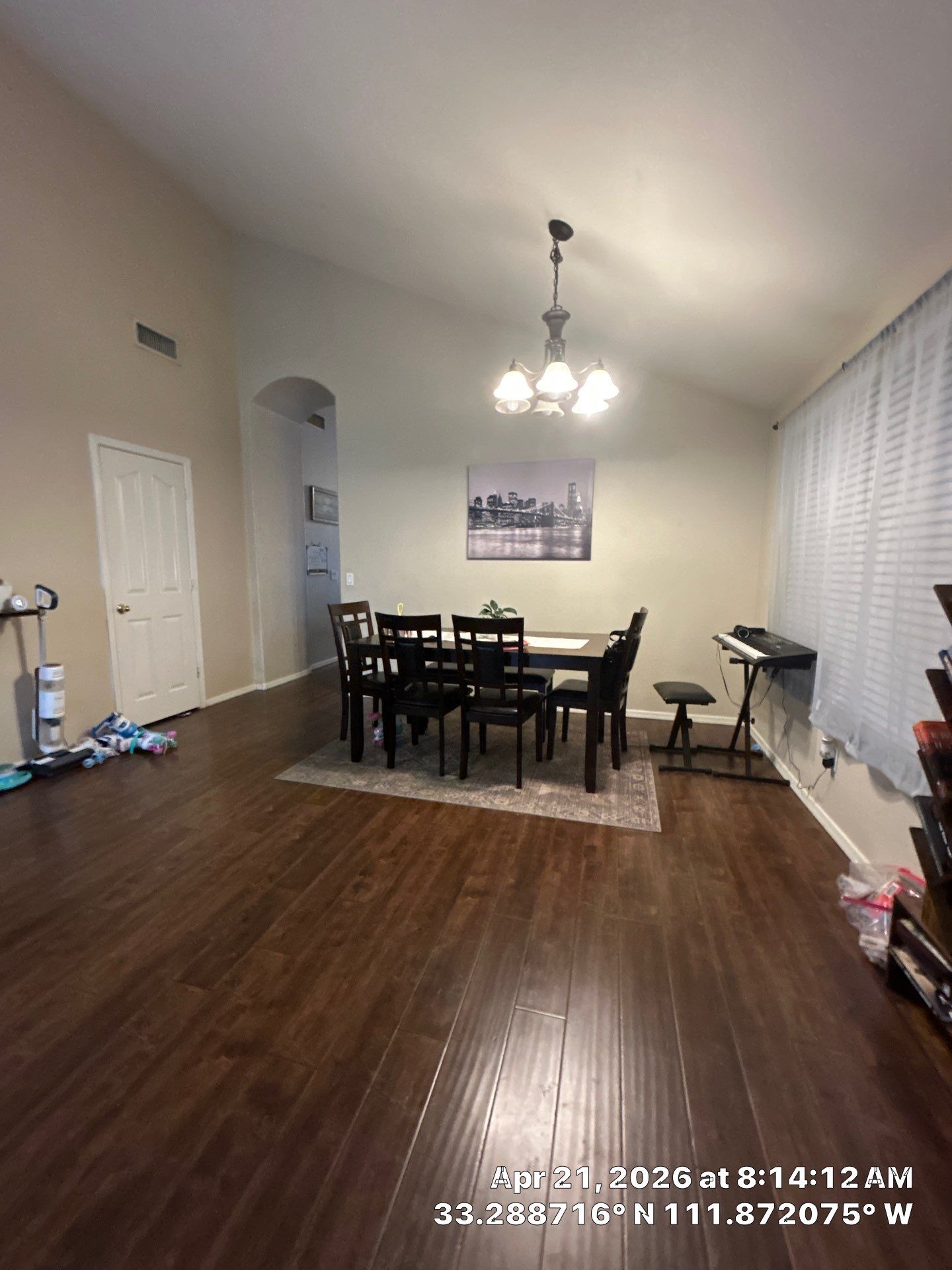 Dark Wood Laminate Floor Installation and Dining Room Renovation in Chandler by CompanyCam Sales Demo