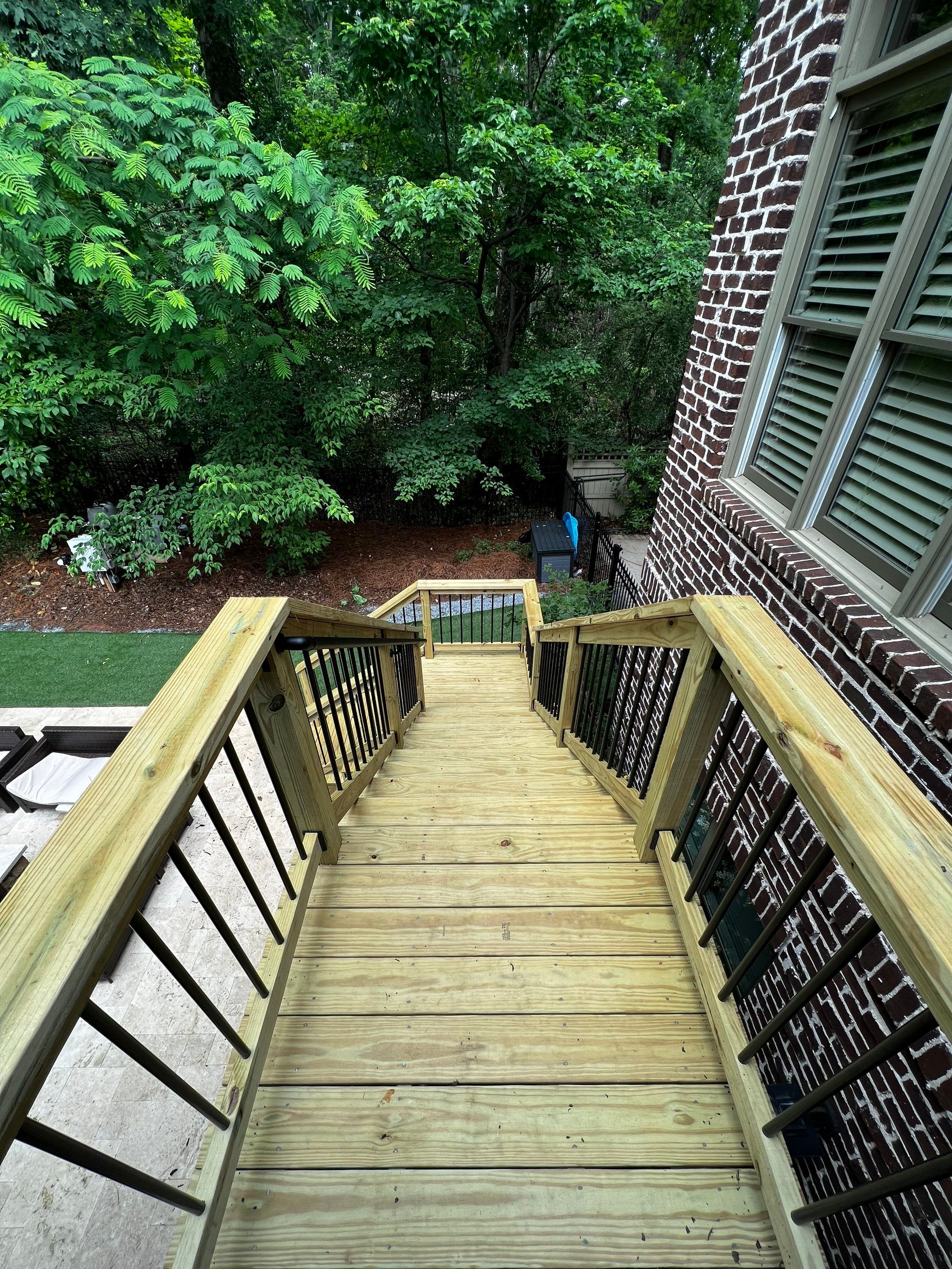 Custom Deck Stairway Addition with Metal Balusters in Atlanta by Swift Home Renovations 