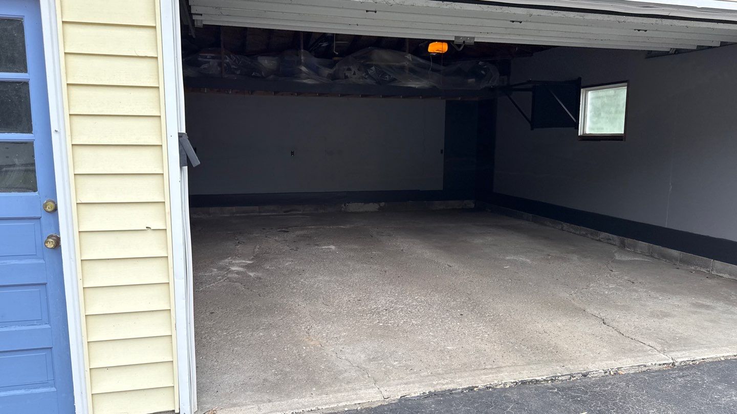 Concrete garage floor replacement and epoxy coating installed  by NG Masonry & Construction LLC