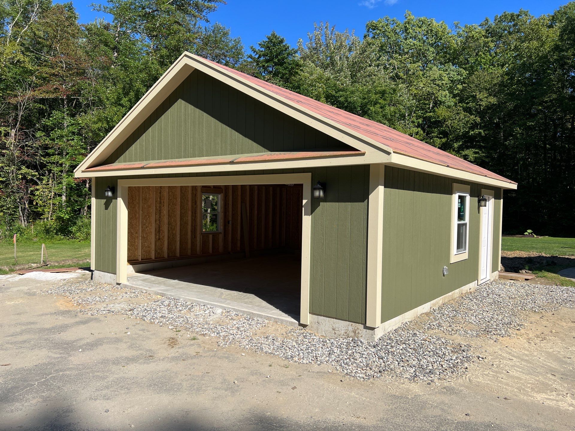 Two-Car Garage using LP SmartSide Panel Siding by Chagnon Building & Remodeling LLC