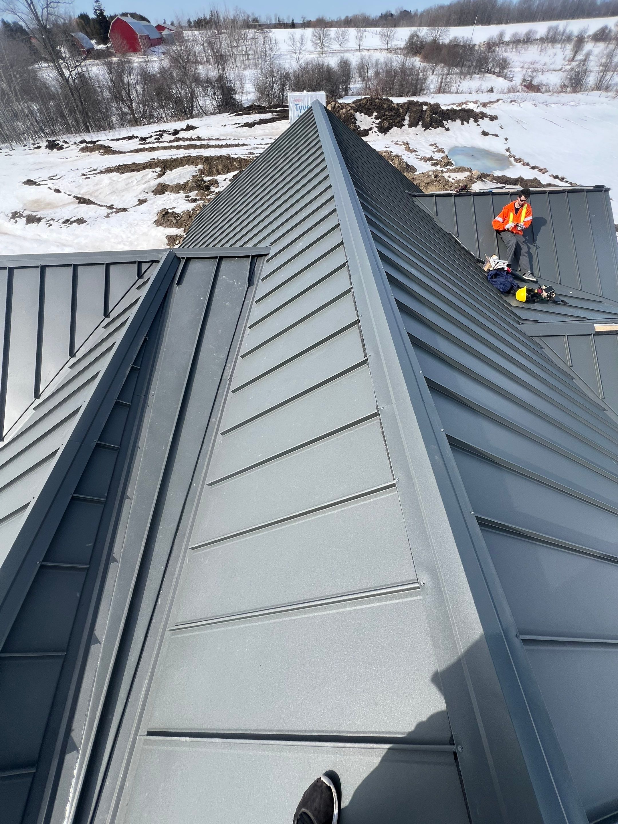 New Home Construction using 16" Standing Seam Panels by Jay Carter Roofing & Sheet Metal