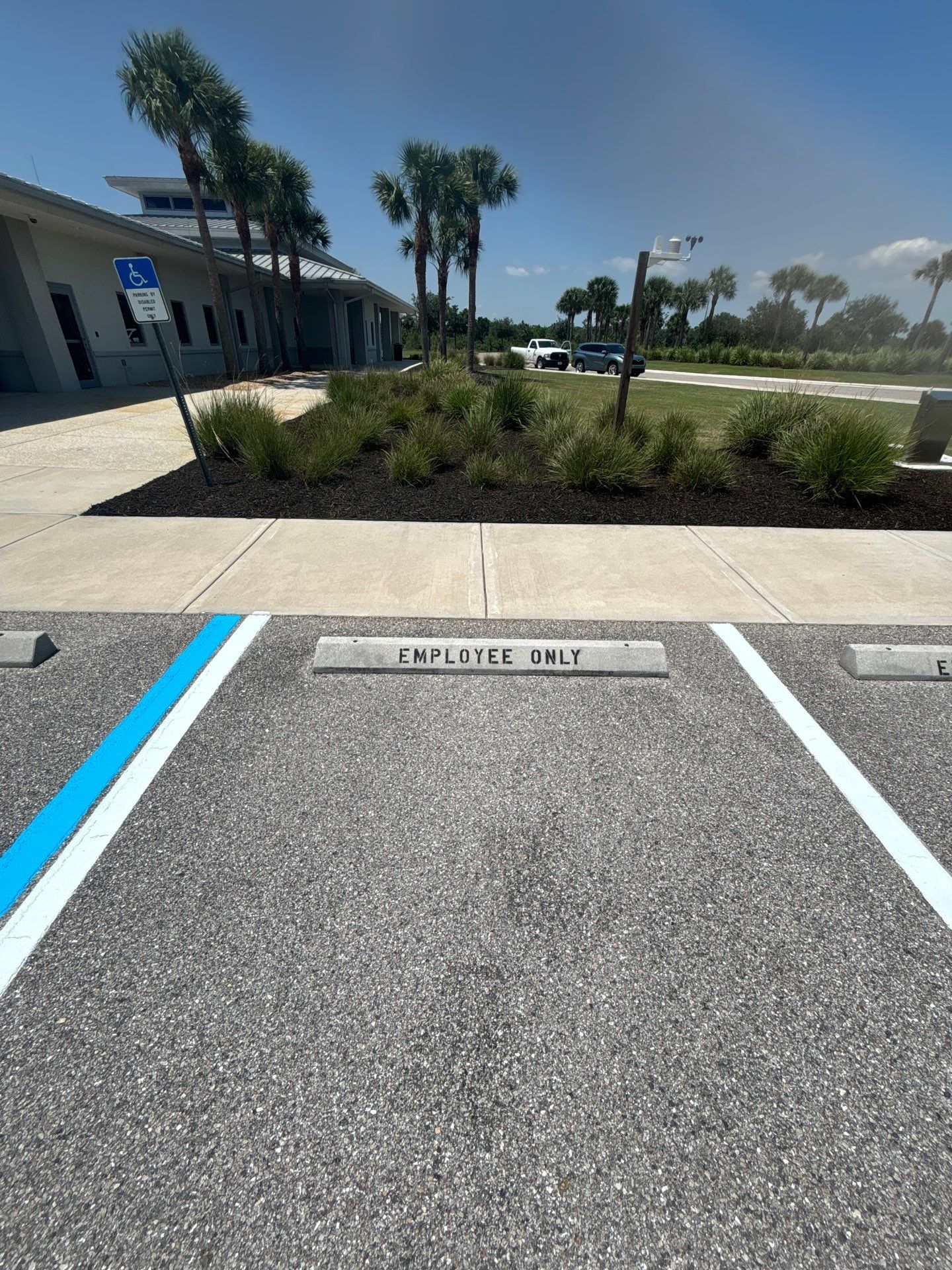 Line striping at Sarasota National Cemetery by Everline Coatings & Services - Southwest FL