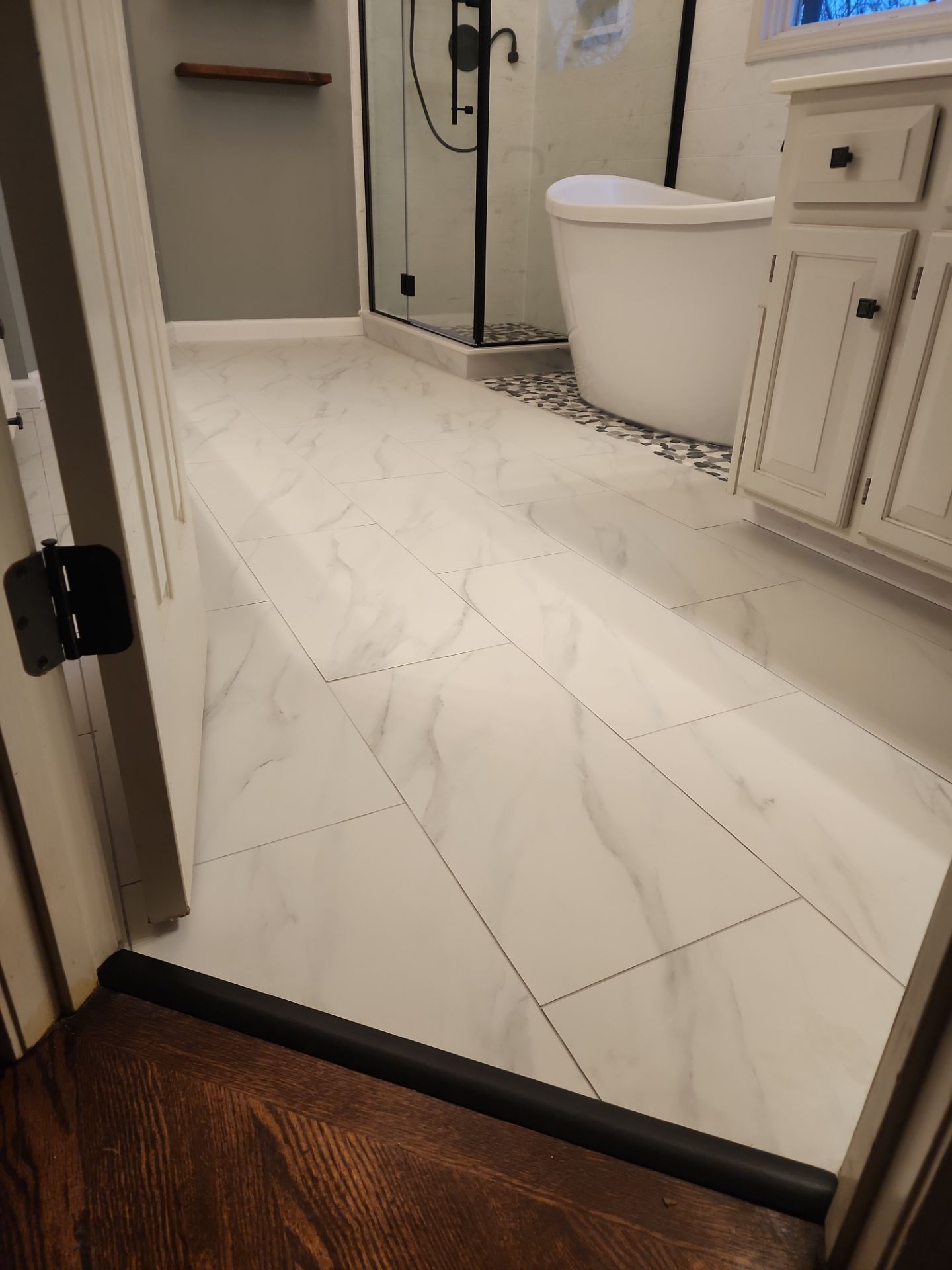 Beautiful use of many materials by The Shower Company
