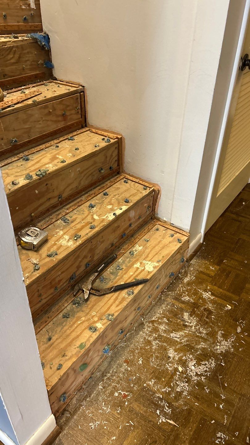 Parquet floor and stair treads by Footprints Floors of Nashville