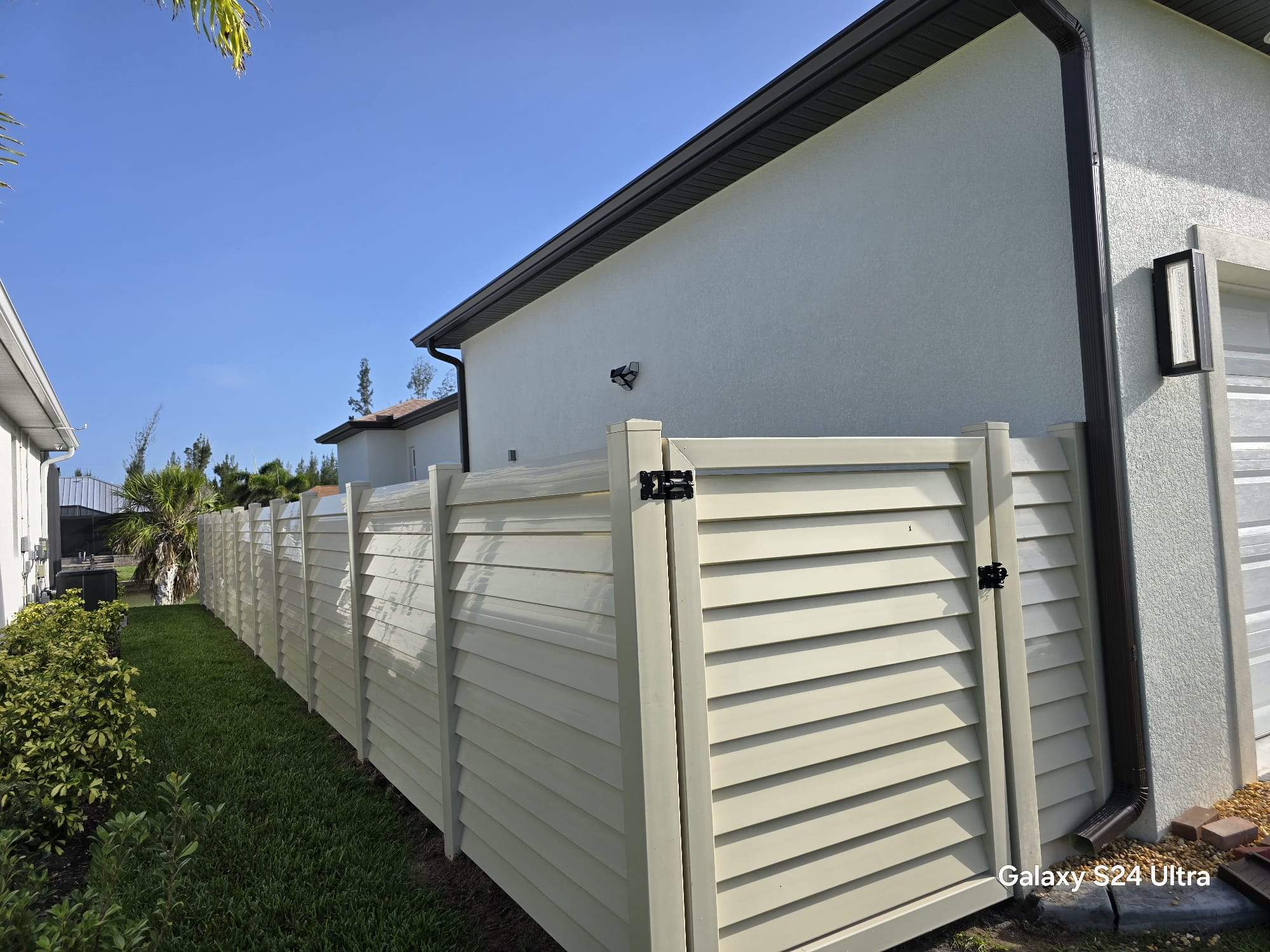 Tan Louvered Vinyl in Port Charlotte by True Fence LLC